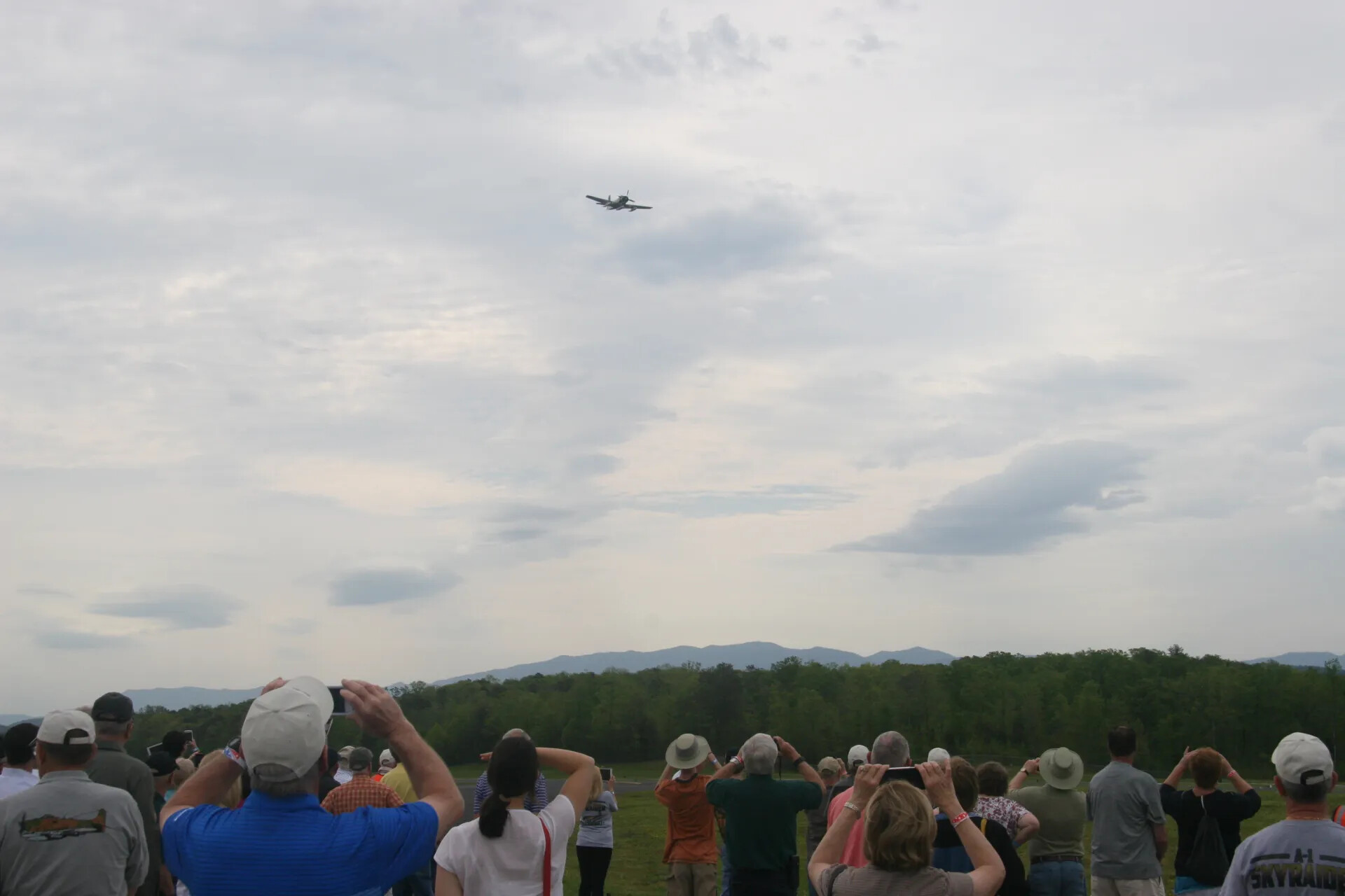 Spectators Observe A-1 Skyraider Flyover at Operation Tailwind Commemorative Event, 2016