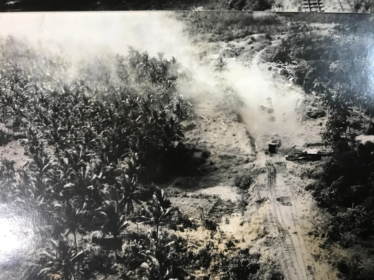 Aerial Strike Photograph: Railway and Supply Target Under Attack, Pacific Theater