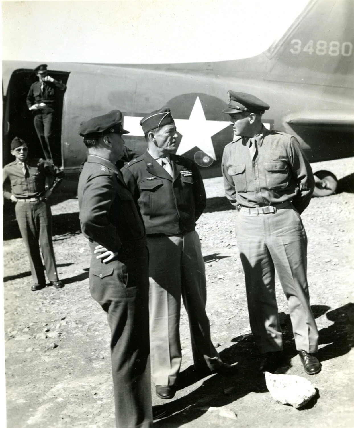 Senior American Officers Confer Beside Transport Aircraft No. 34880, CBI Theater, WWII
