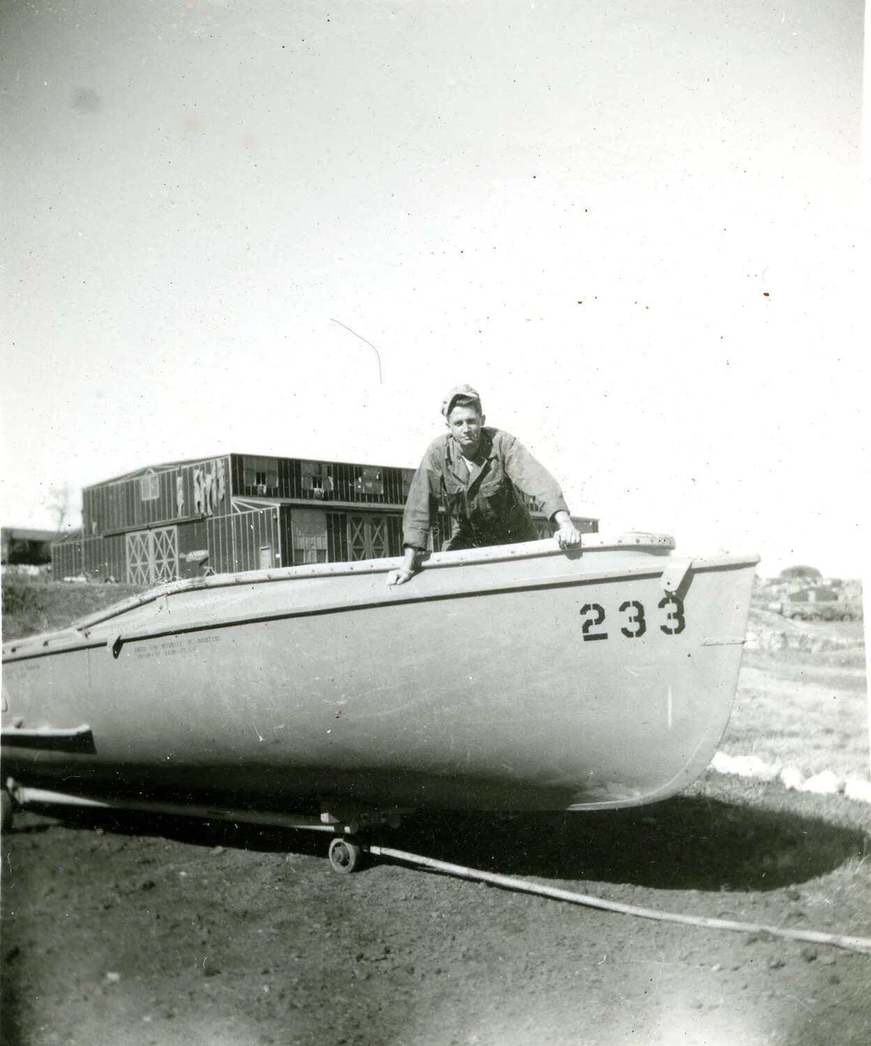 Serviceman with Numbered Crash/Rescue Boat "233" on Trailer, Keesler Field, 1946