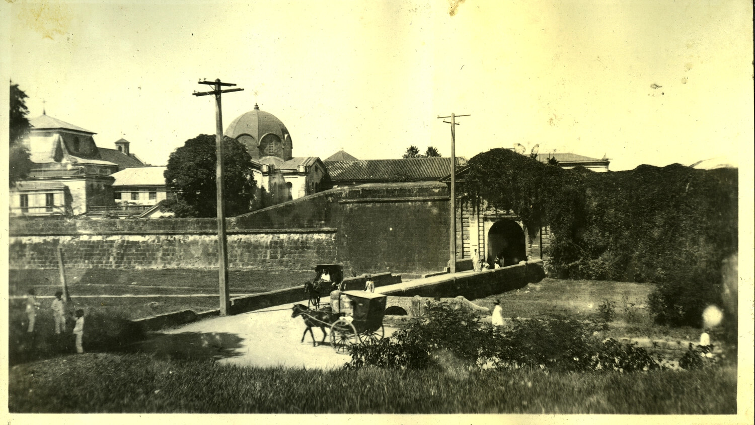 Intramuros Walls, Moat, and Gate with Horse-Drawn Calesa, Manila, Philippines, c. 1920s-1930s