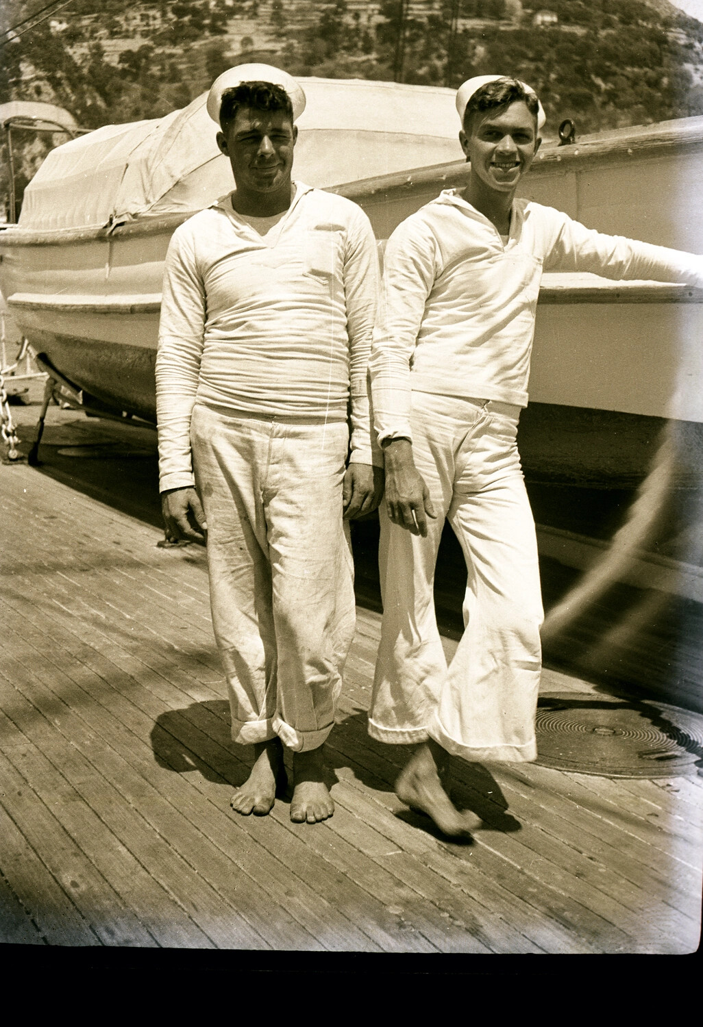 Two US Navy Sailors on Deck Beside Ship's Boat, China Station, 1930s