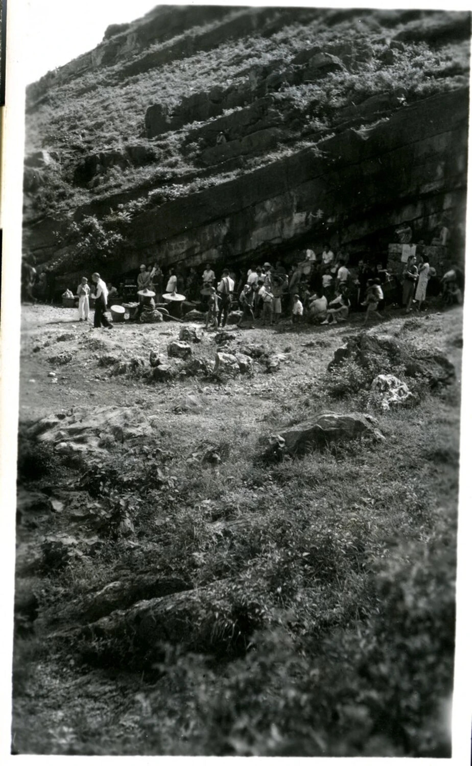 Crowd Gathered at Cave/Grotto Cliff Face, China-Burma-India Theater, WWII Era