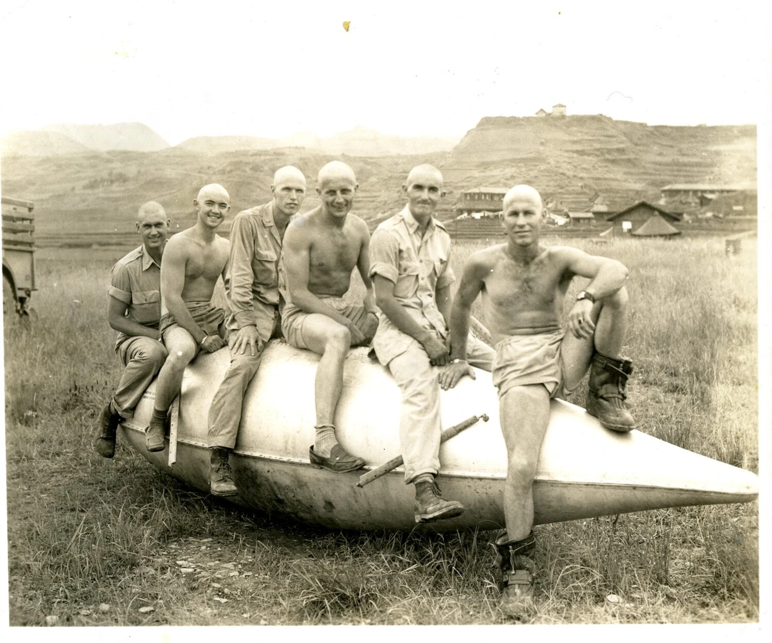 Airmen Posing on External Fuel Drop Tank, China-Burma-India Theater, WWII