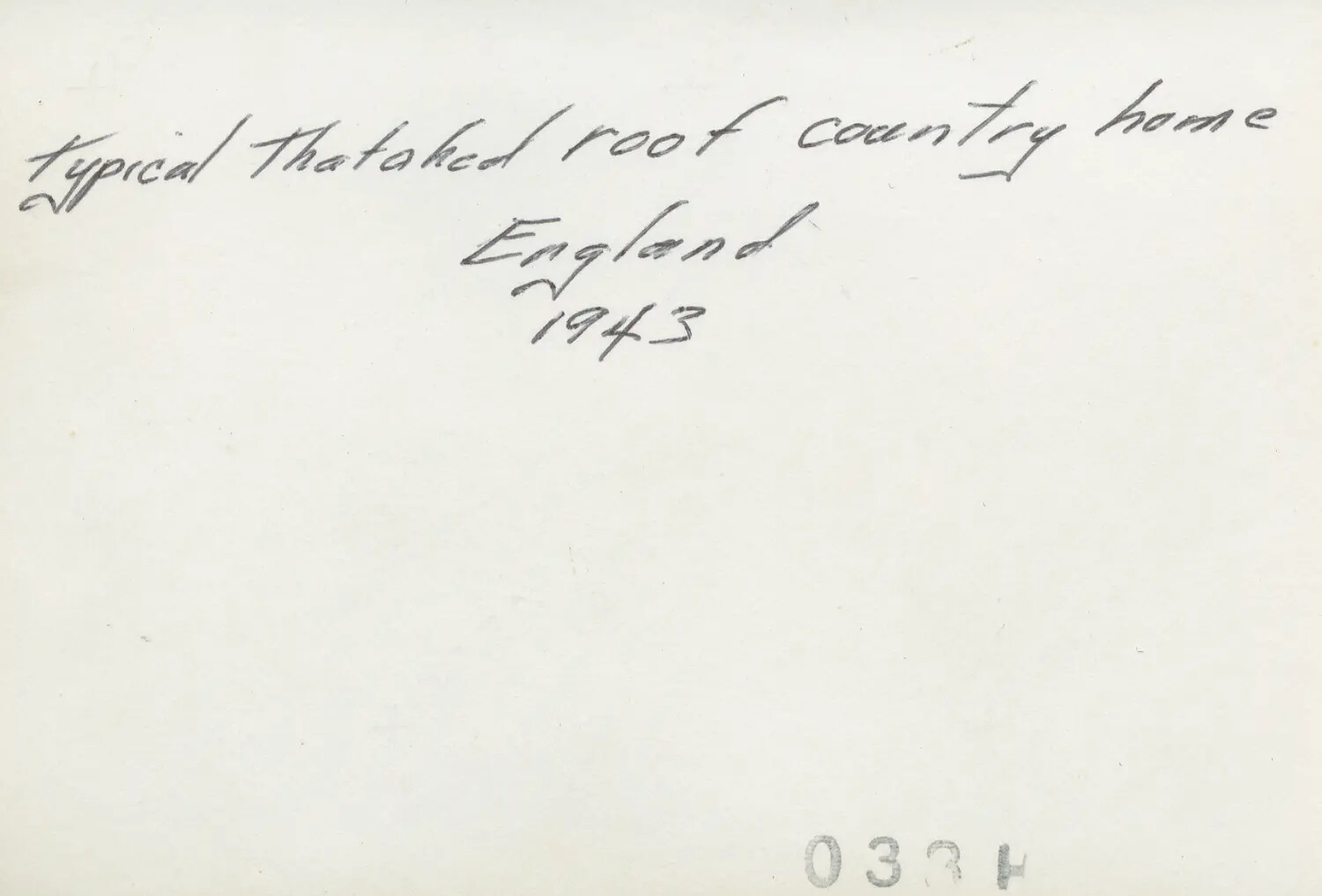 Verso Caption Card: "Typical Thatched Roof Country Home, England, 1943"