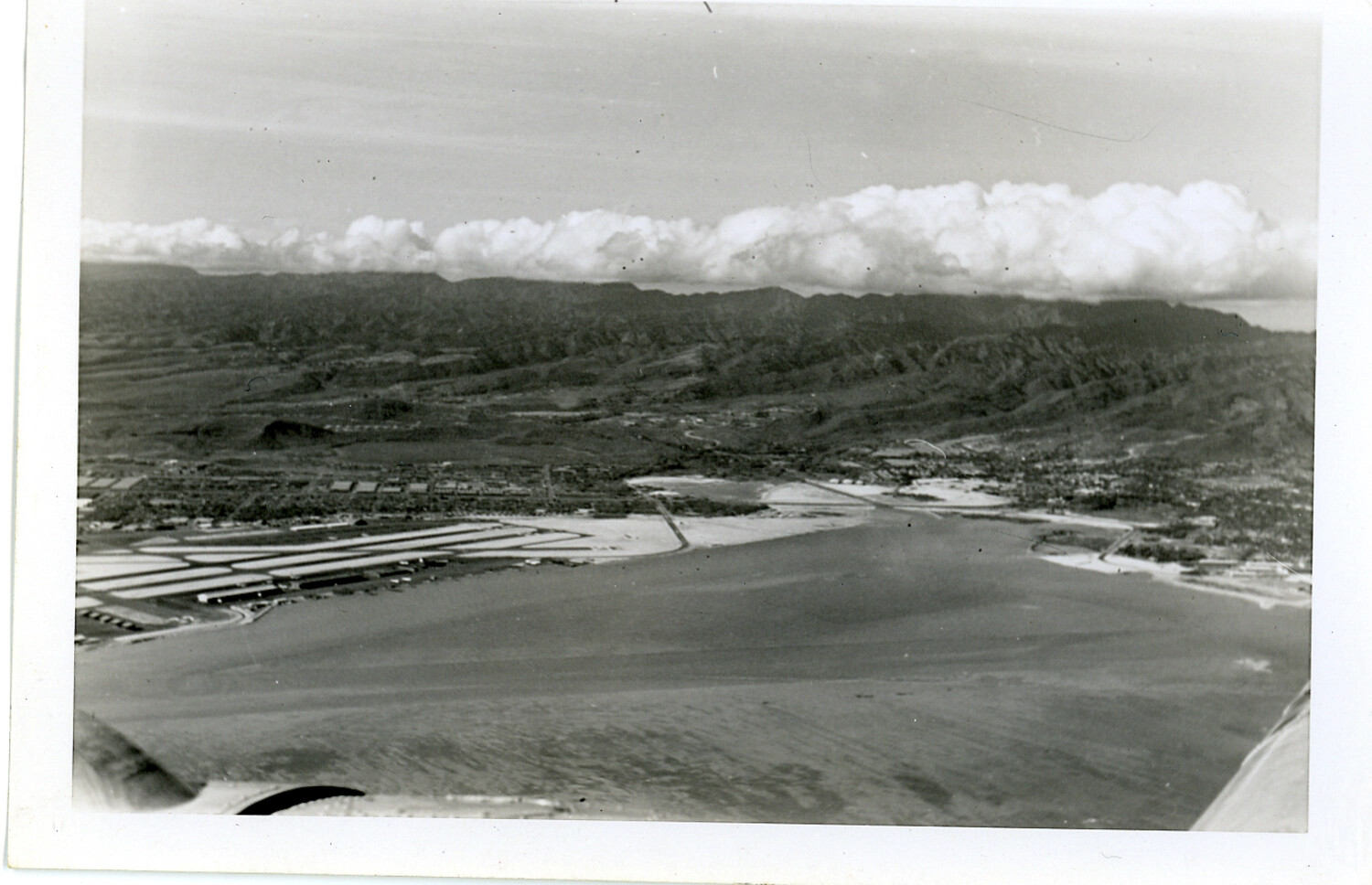 Aerial View of a Hawaiian Bay and Coastal Settlement, Likely Windward Oahu