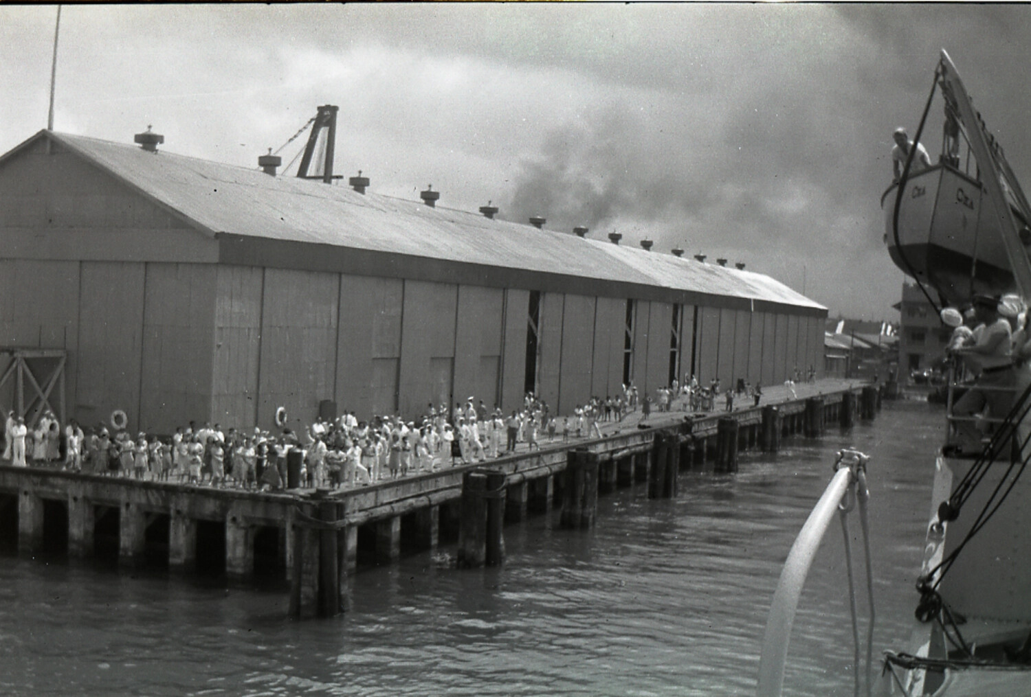 Crowd Gathers Dockside at a Chinese Port Wharf, WWII Era