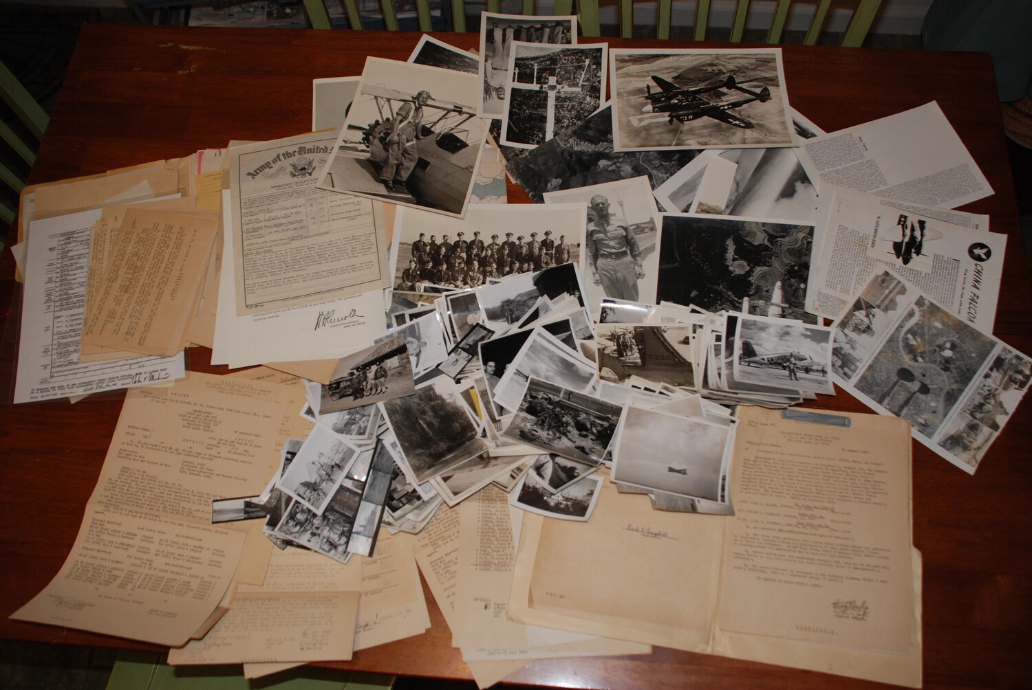 Overview of WWII China-Burma-India Theater Archive Collection: Documents and Photographs Spread on Table