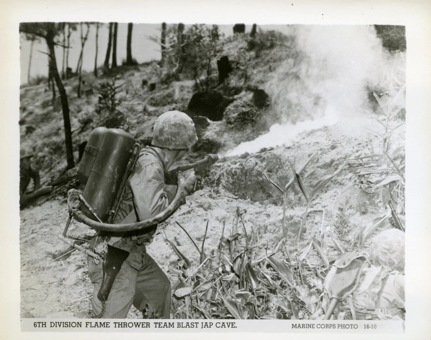 6th Marine Division Flamethrower Team Attacks Japanese Cave Position, Okinawa, 1945
