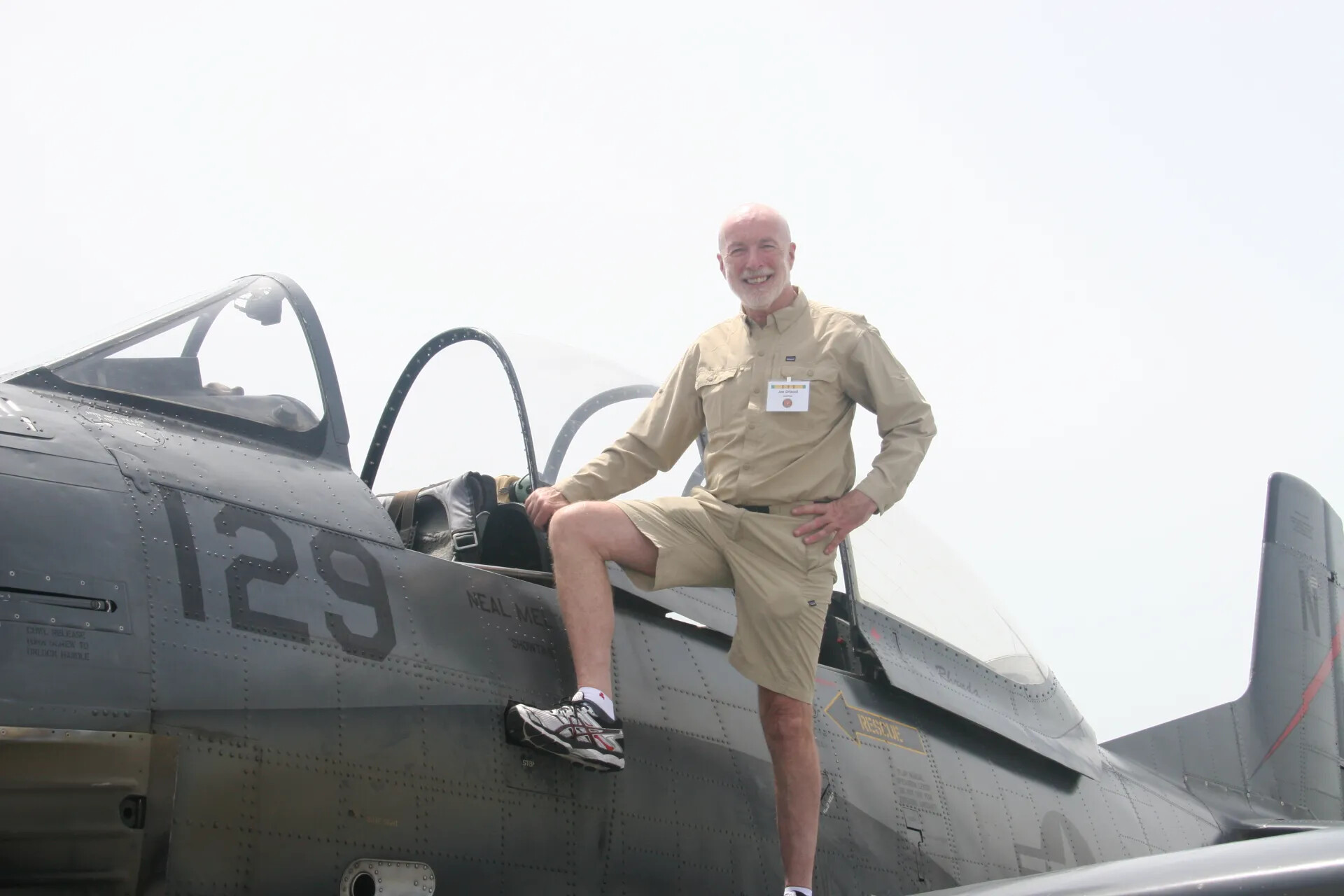 Attendee "Joe" Posing on Wing of T-28-Type Aircraft "Neal Melton — Showtime"