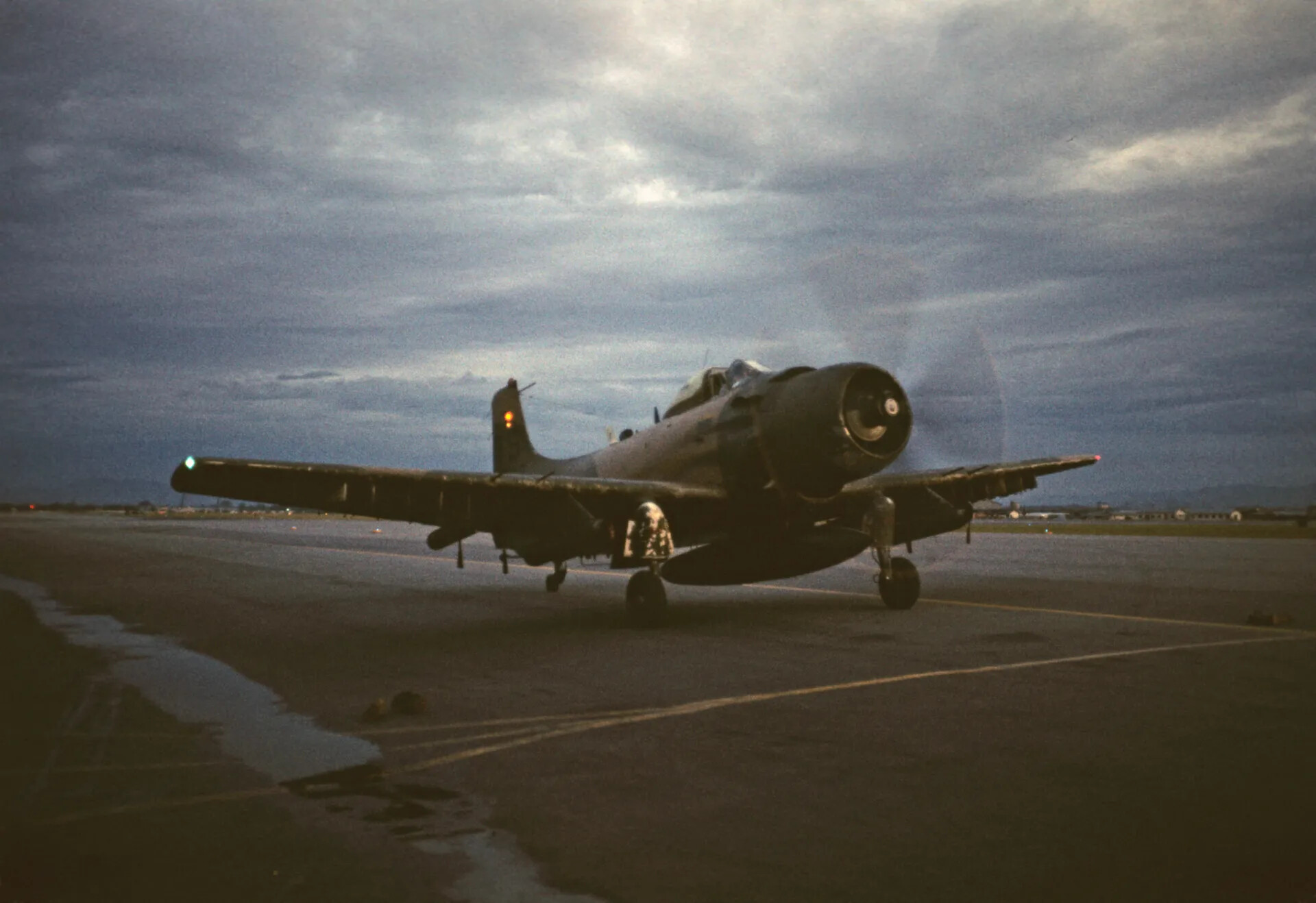 Douglas A-1 Skyraider Taxiing at Dusk, Vietnam War Era (Don Engebretsen Slide Collection)