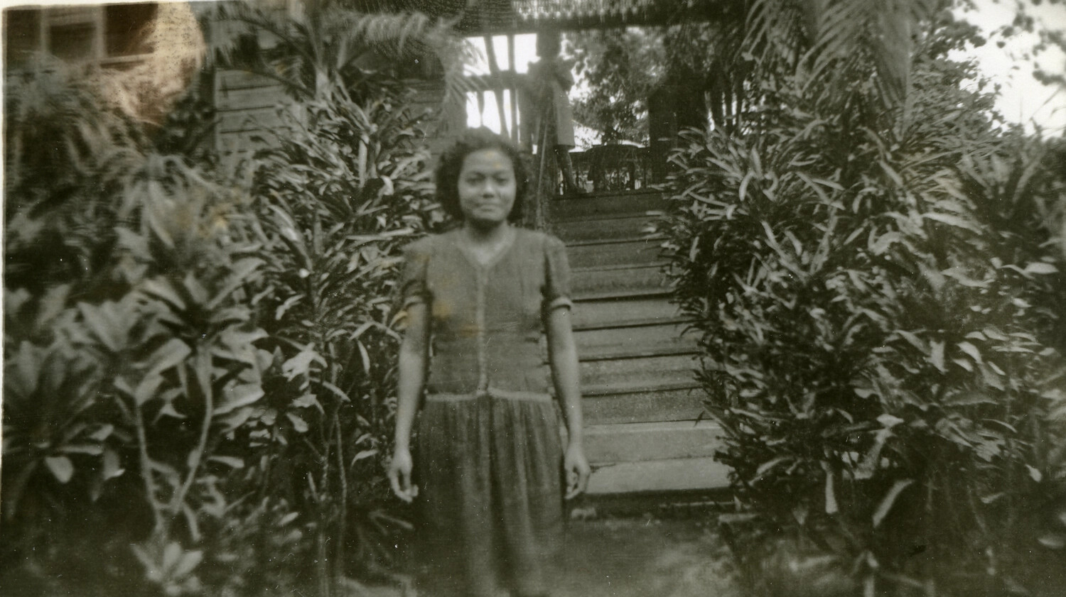 Portrait of a Young Okinawan Woman Before a Staircase, Okinawa, 1945