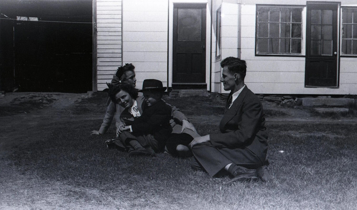 Family Group on Lawn, Playful Pose, Stateside Photograph, WWII Era