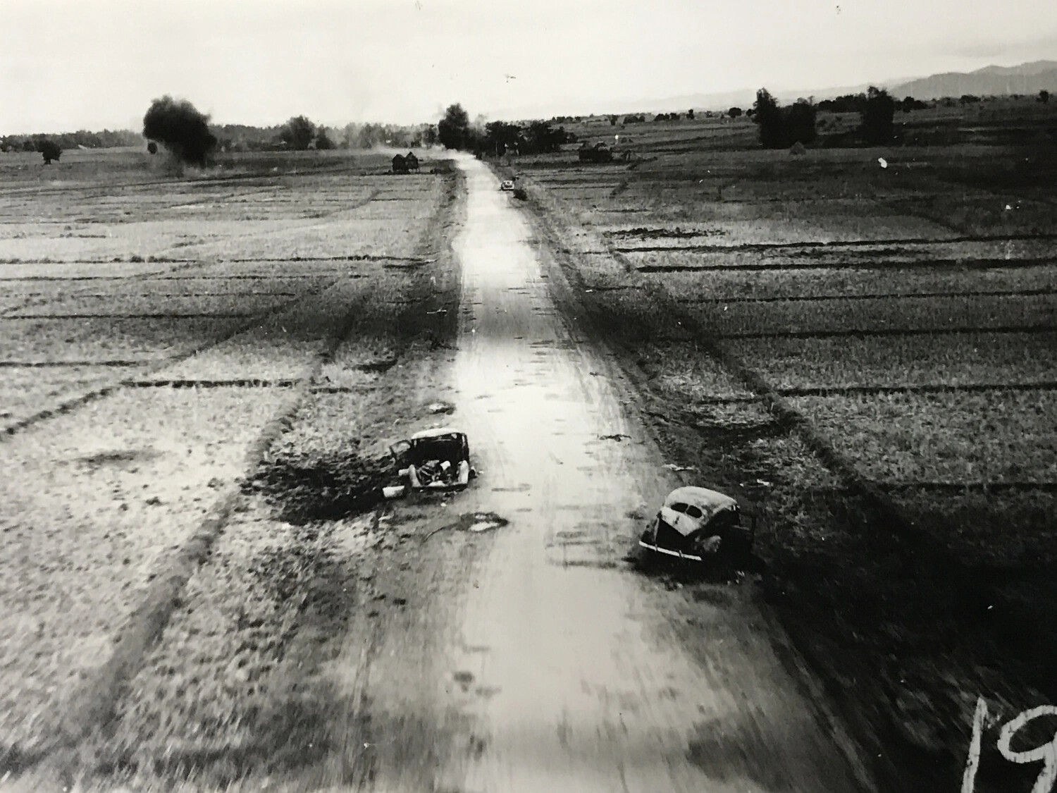 Strafing Attack on Motor Vehicles Along Rural Road, Pacific Theater