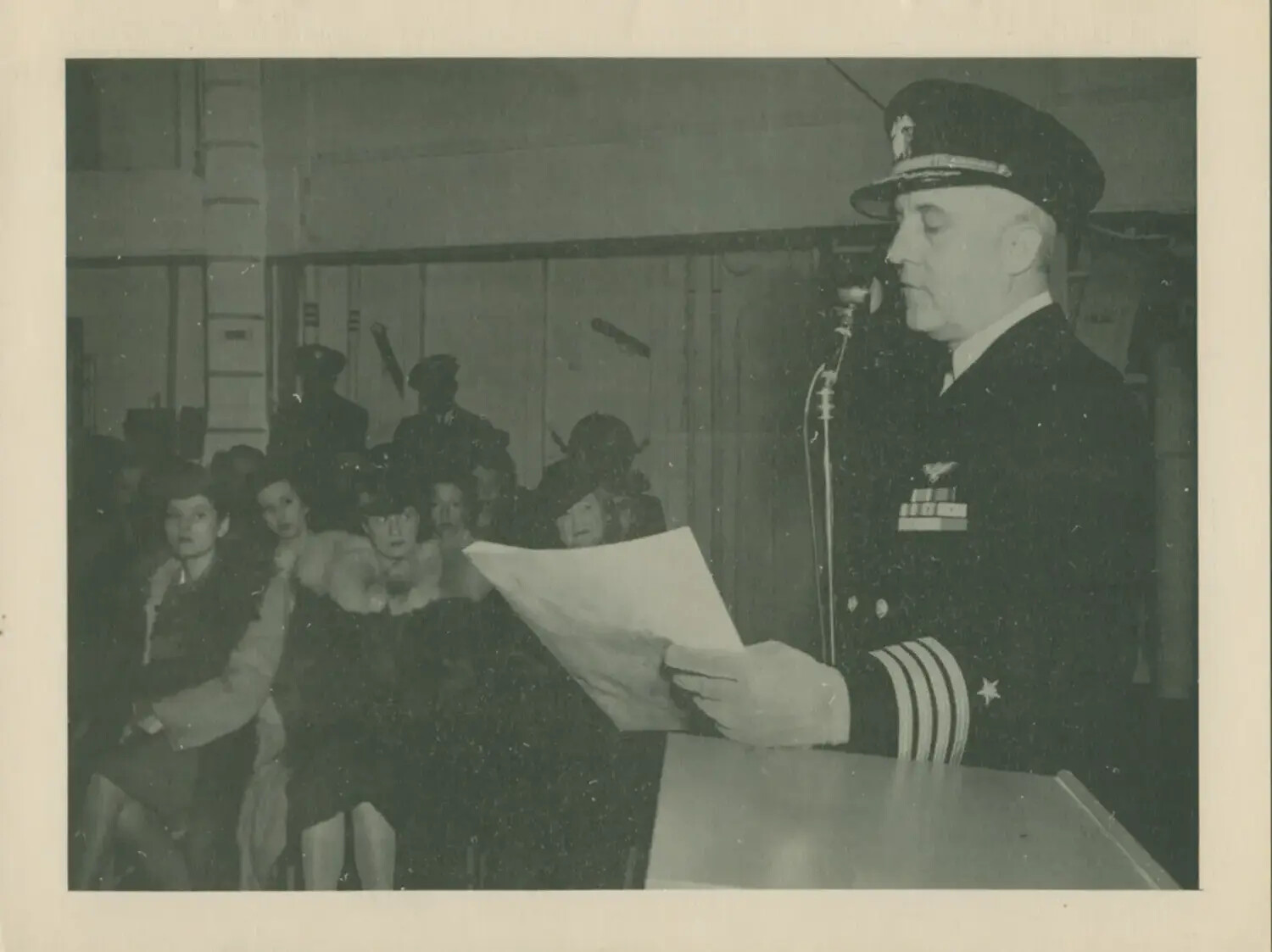 U.S. Navy Captain Addressing Audience at Ceremony, USS Petrof Bay (CVE-80) Collection