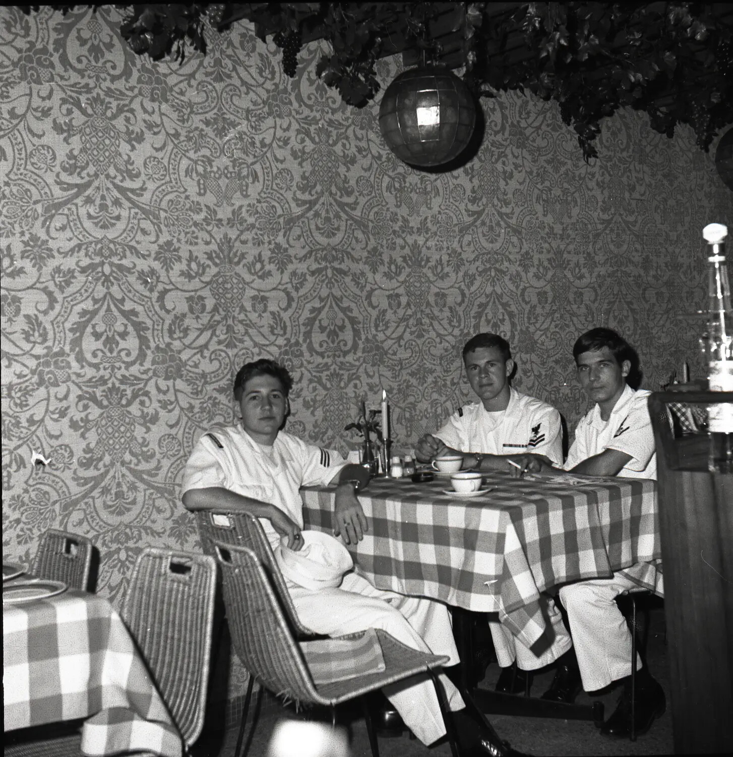 U.S. Navy Sailors on Liberty at Restaurant/Club, USS Ticonderoga Vietnam-Era Deployment
