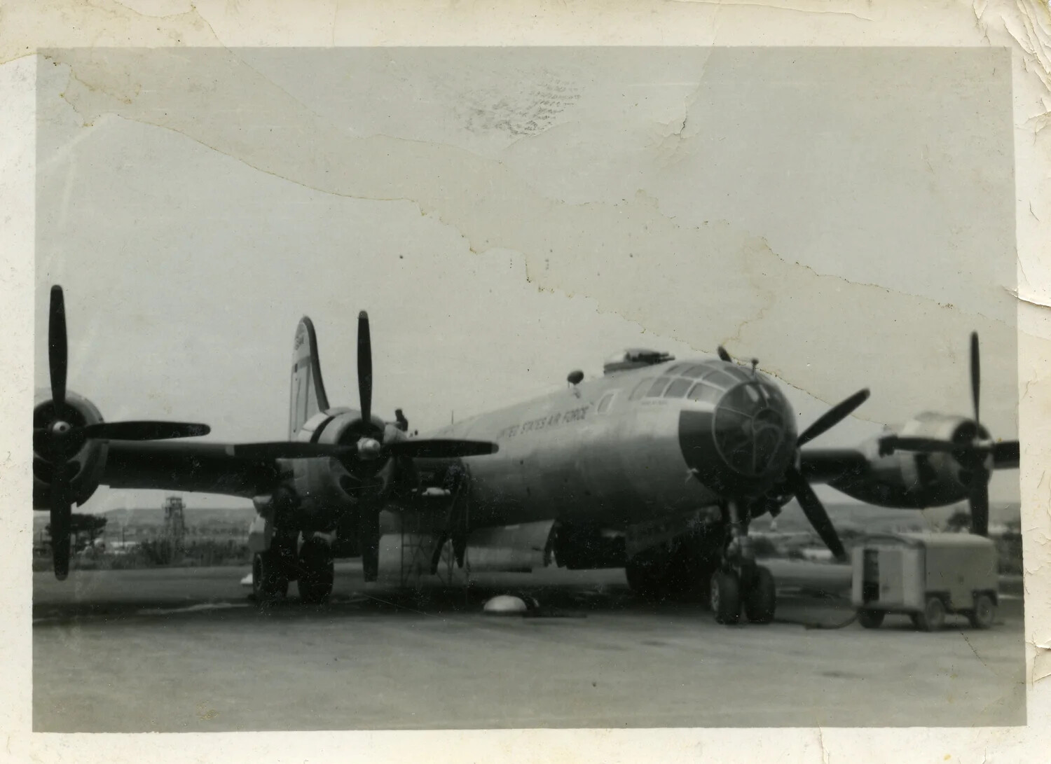 Boeing B-29/B-50 Superfortress Heavy Bomber on Airfield Ramp with Ground Support Equipment