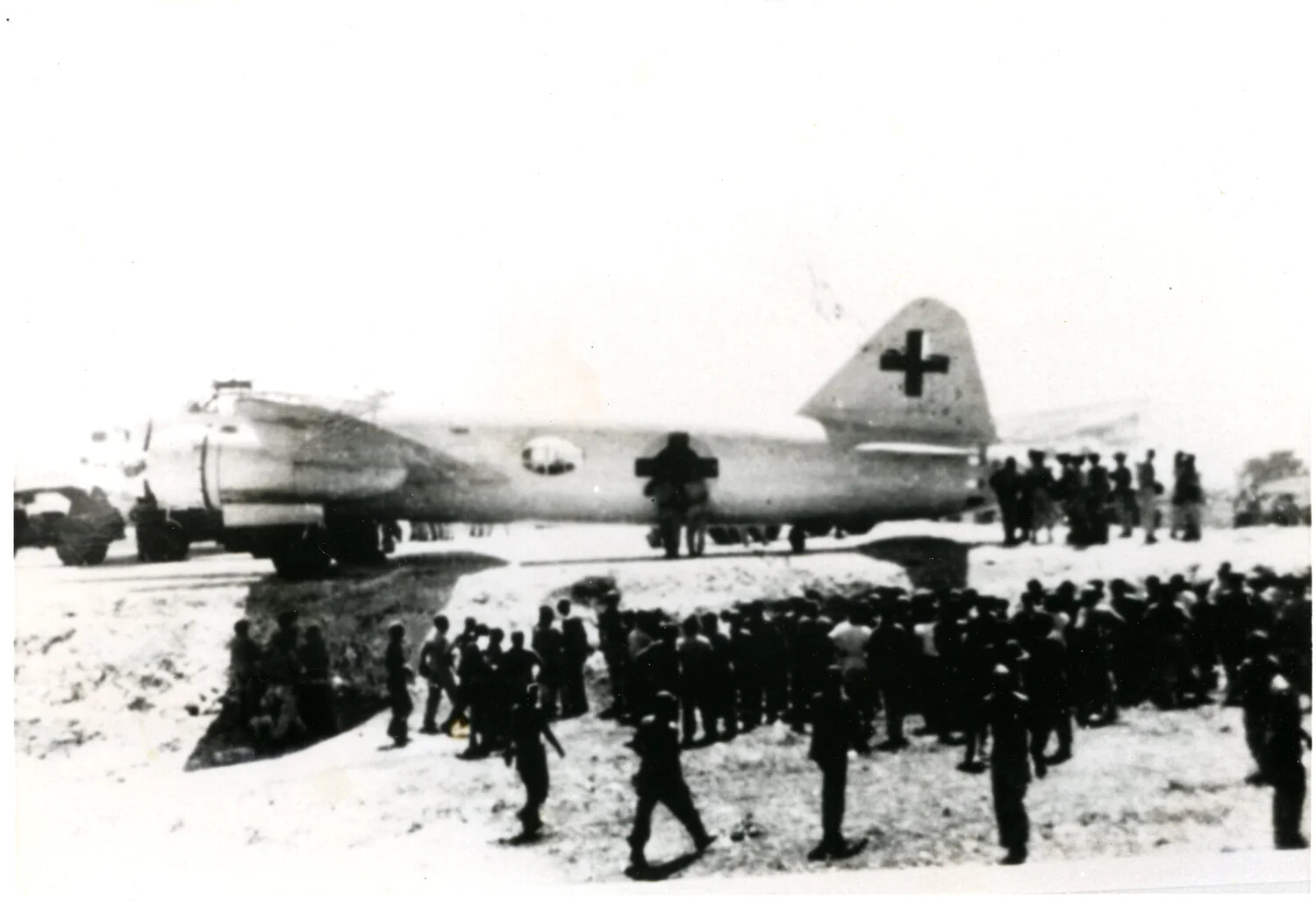 Crowd of American Servicemen Surrounding the Japanese Envoy Bomber, Ie Shima, 19 August 1945