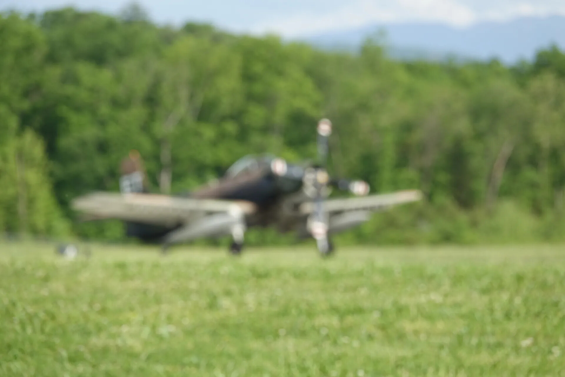 Unidentified Dark Blue Radial-Engine Warbird Taxiing, May 2019 Warbird Event (Sequence Frame 2, Out of Focus)