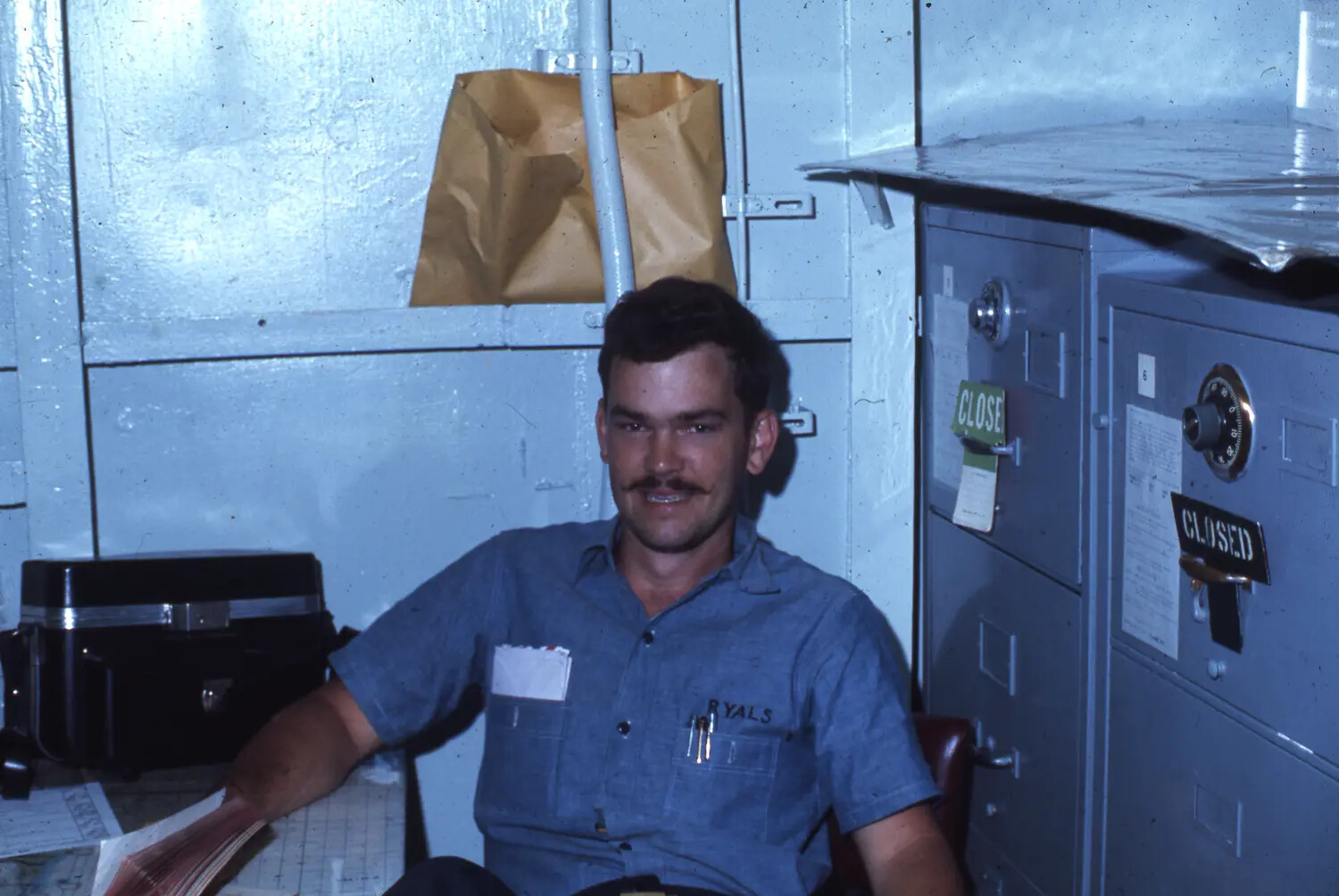 Portrait of Sailor 'Ryals' in Shipboard Office, USS Ticonderoga, Vietnam War Era