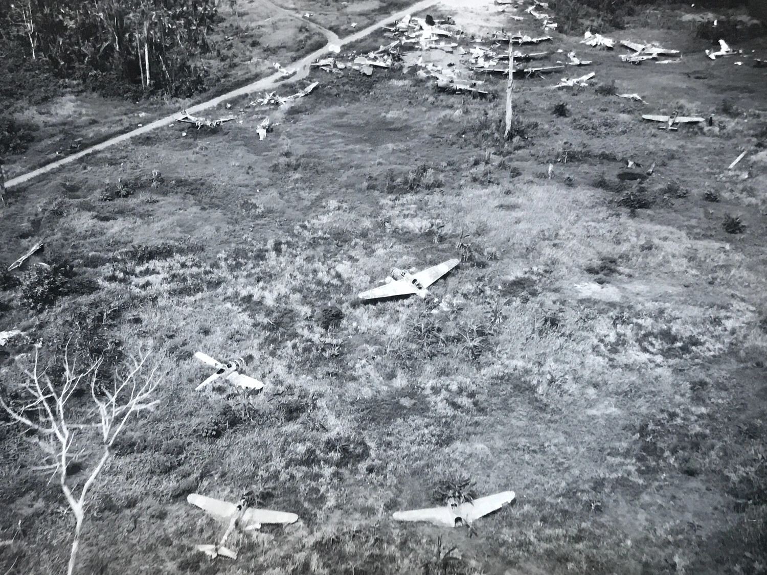 Boneyard of Wrecked Japanese Aircraft, Wewak Airstrip, New Guinea