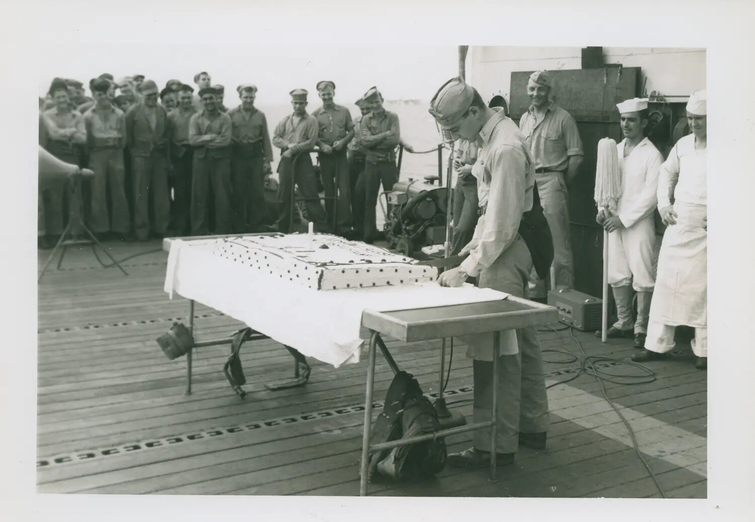 Cake-Cutting Ceremony Aboard USS Petrof Bay (CVE-80), WWII
