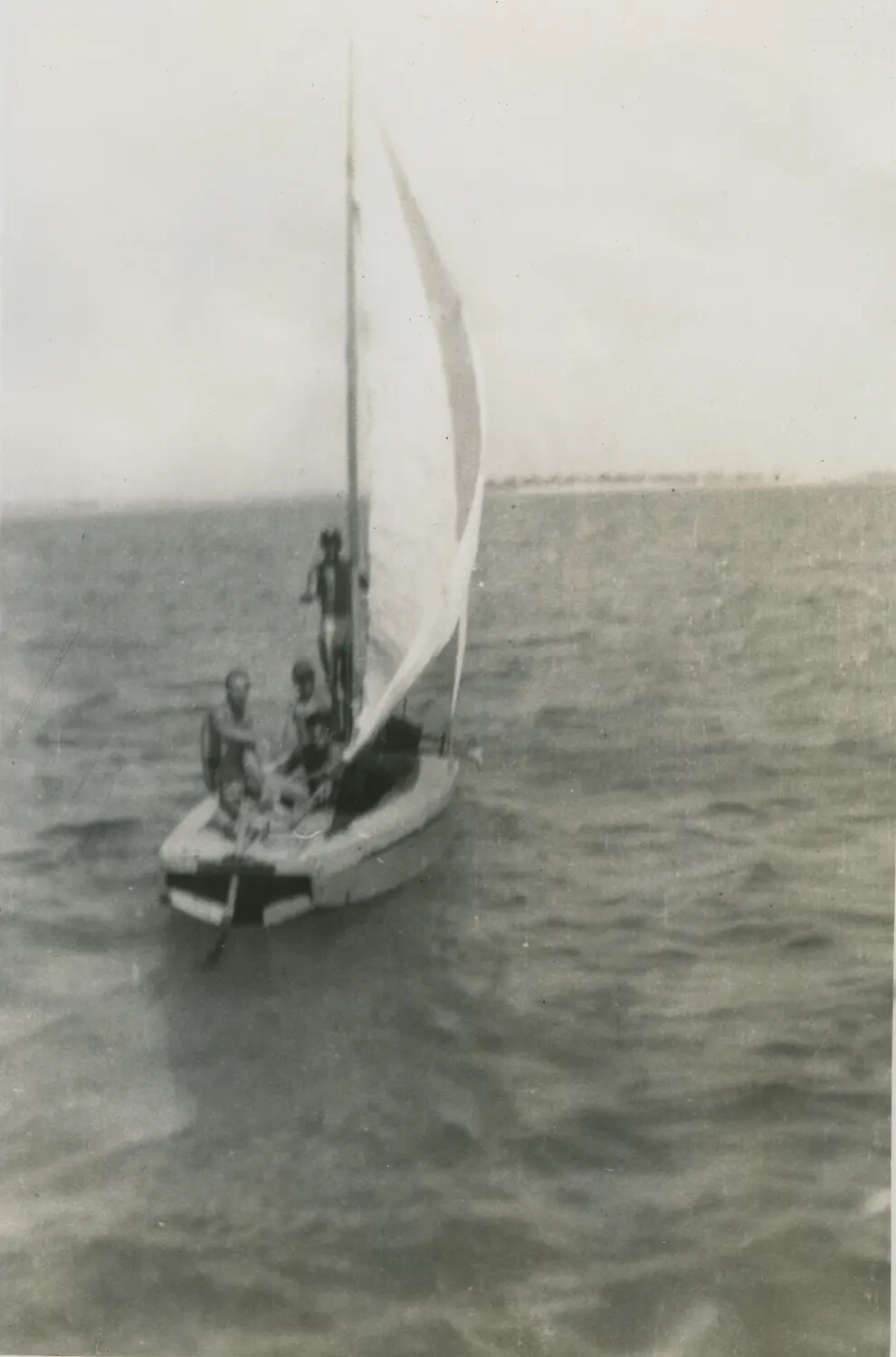 Small Sailboat with Crew on Calm Water, Personal Snapshot