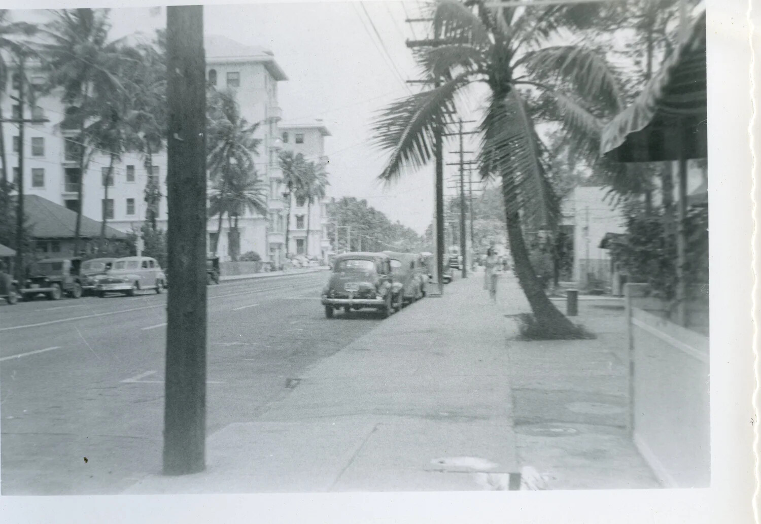 Street View with Hotel Buildings and Parked Automobiles, Honolulu, Hawaii