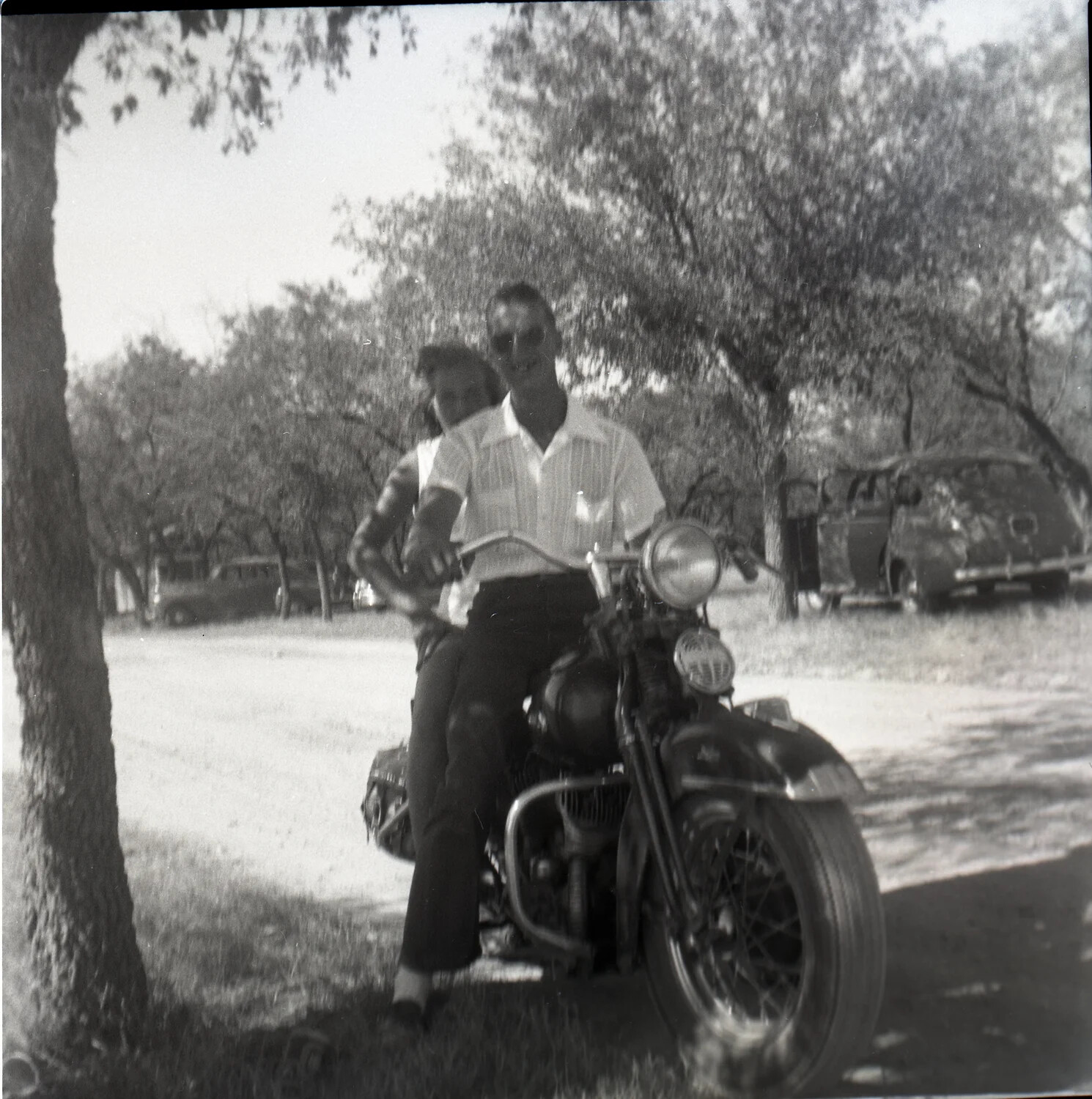Couple on a Motorcycle in a Park Setting, Glenn Haidet Personal Photo Collection
