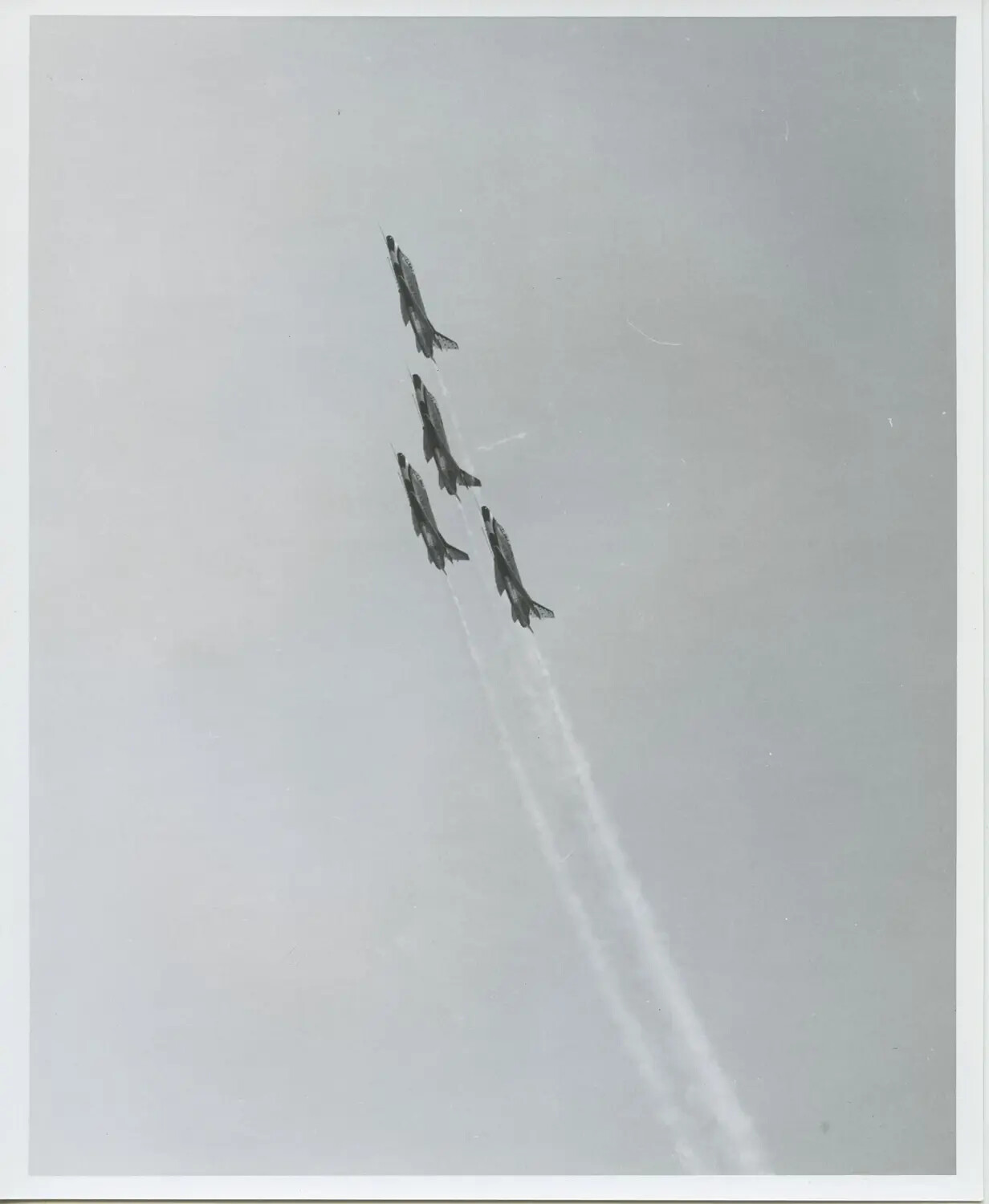 Thunderbirds F-100 Super Sabres Climbing in Tight Formation