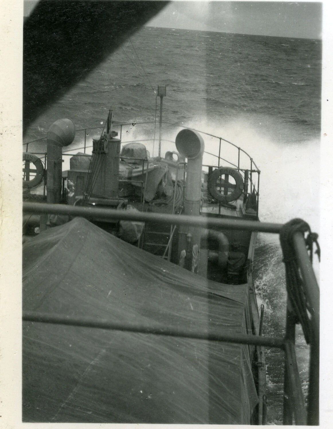View Aft from the Deck of U.S. Army Transport Vessel F-115 Underway in Heavy Seas, Southwest Pacific Area, World War II