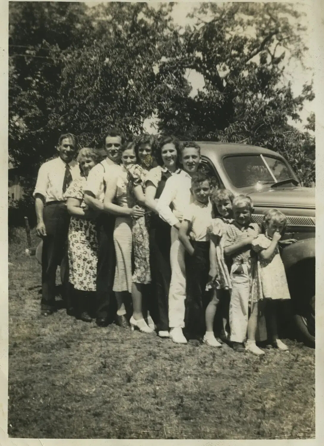 Extended Family Group Portrait Beside Automobile, 1930s (Civilian Snapshot, Pre-War Personal Collection)