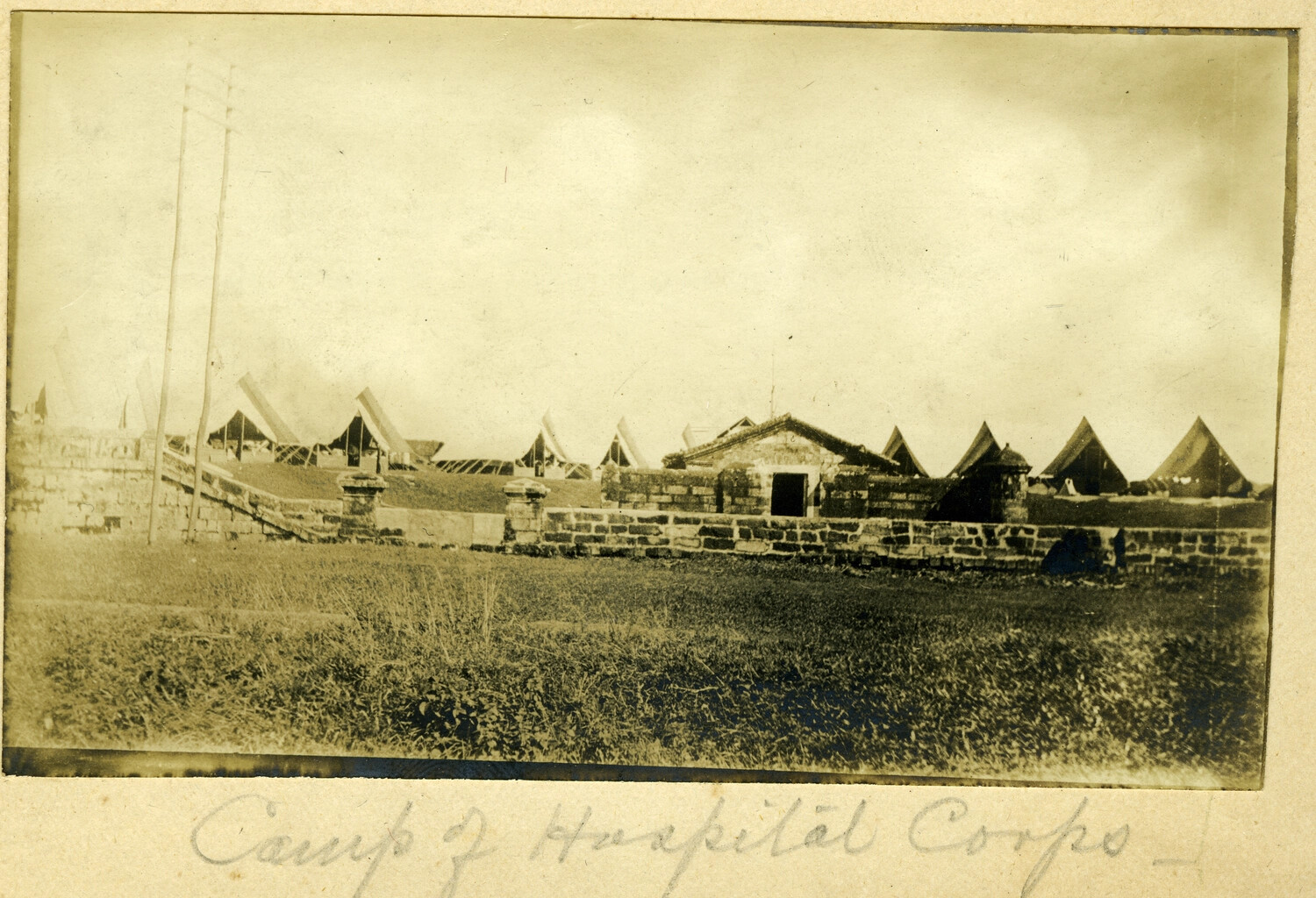 "Camp of Hospital Corps" — U.S. Army Encampment Behind Stone Wall, Philippines, Early 1900s