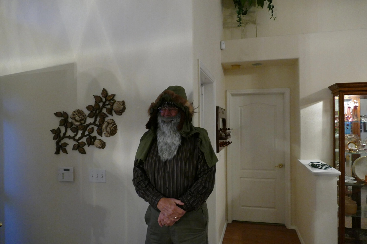 Interview Subject Demonstrating Cold-Weather Military Parka, Joseph Smith Interview Series