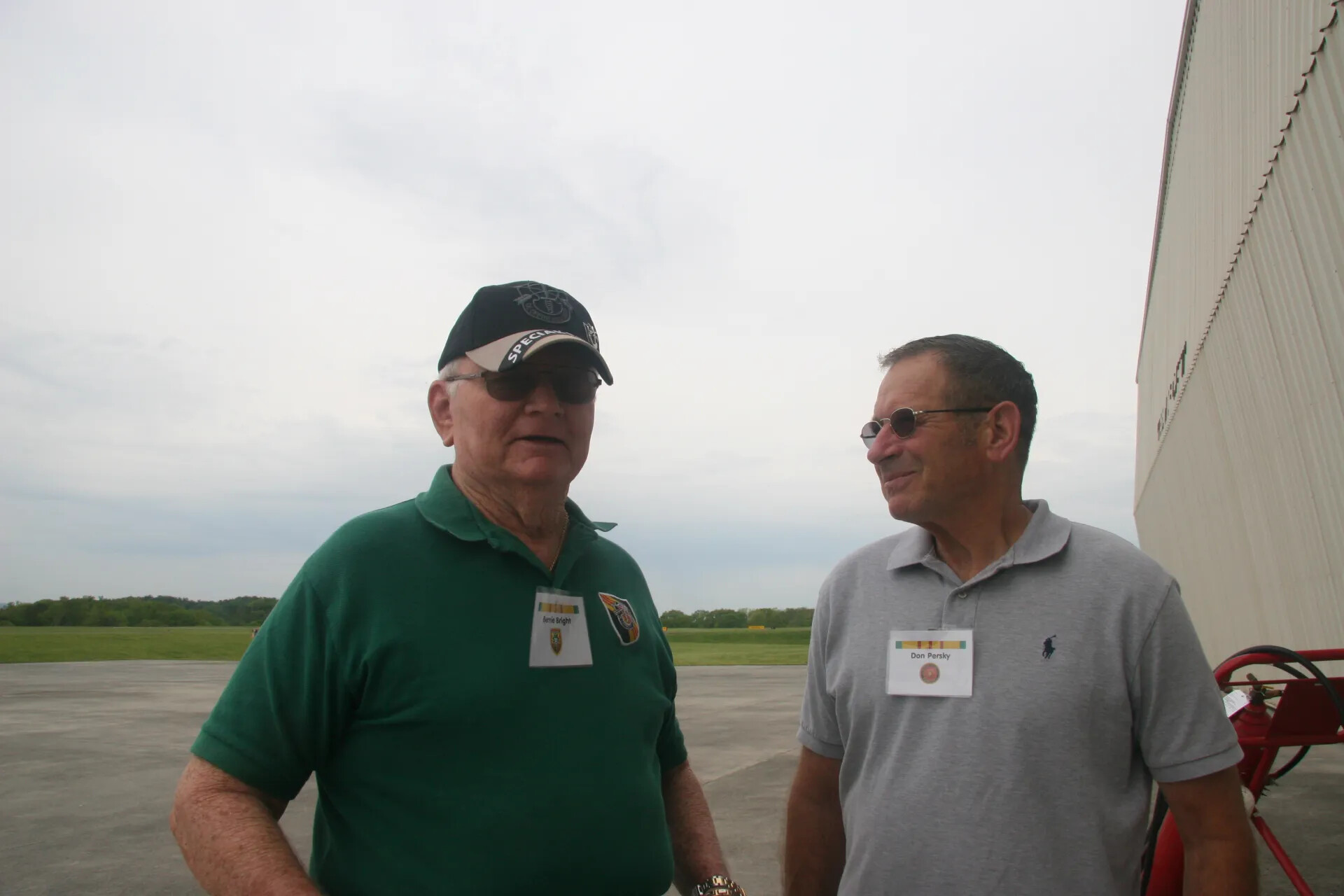 Portrait of Attendees 'Bernie Bright' and 'Don Persky,' Airport Ramp