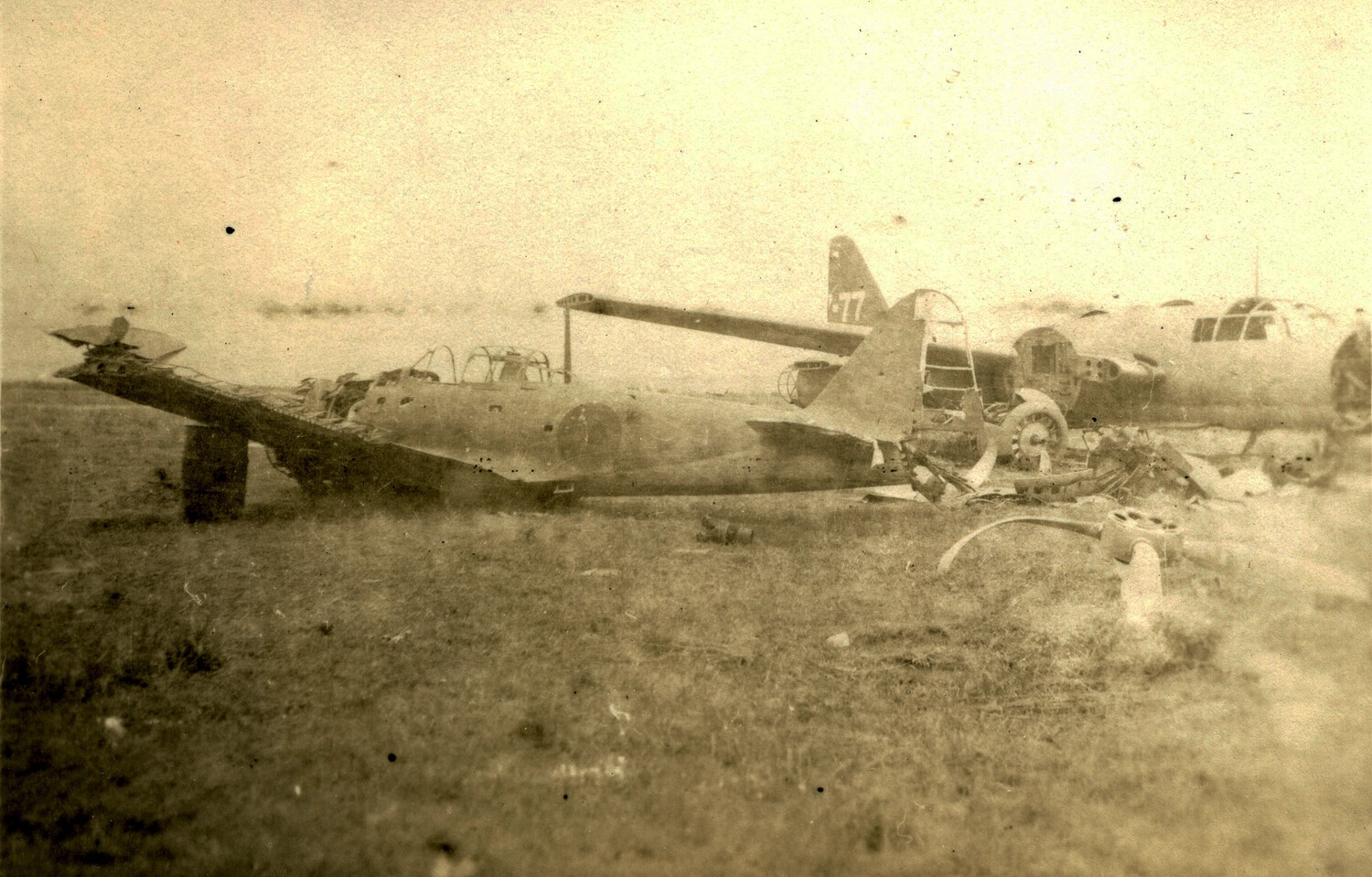 Wrecked Japanese Twin-Engine Bomber, Captured Airfield