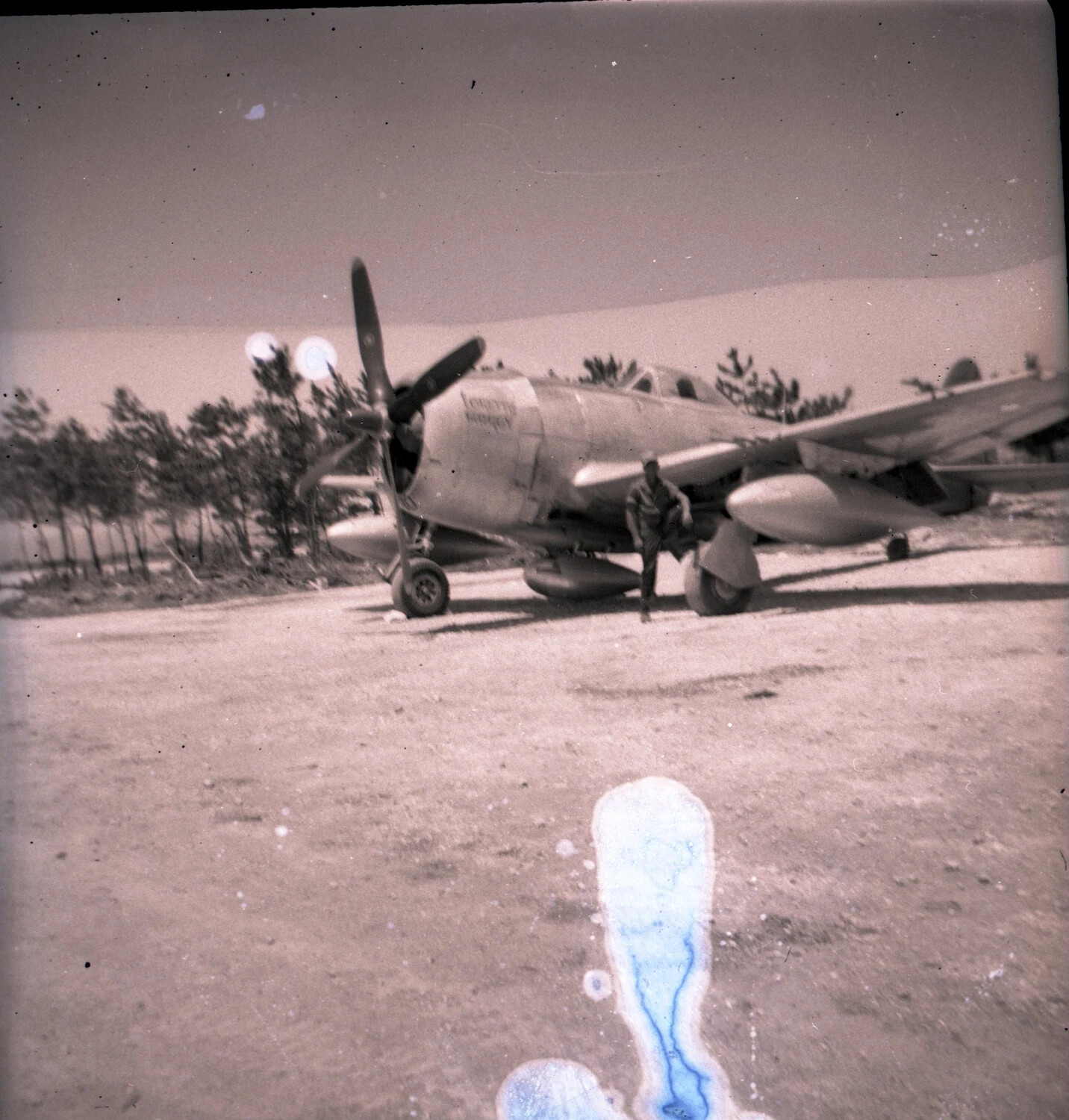 Twin-Boom Fighter Aircraft (P-38 Lightning type) on Pacific Airfield, Ie Shima, WWII