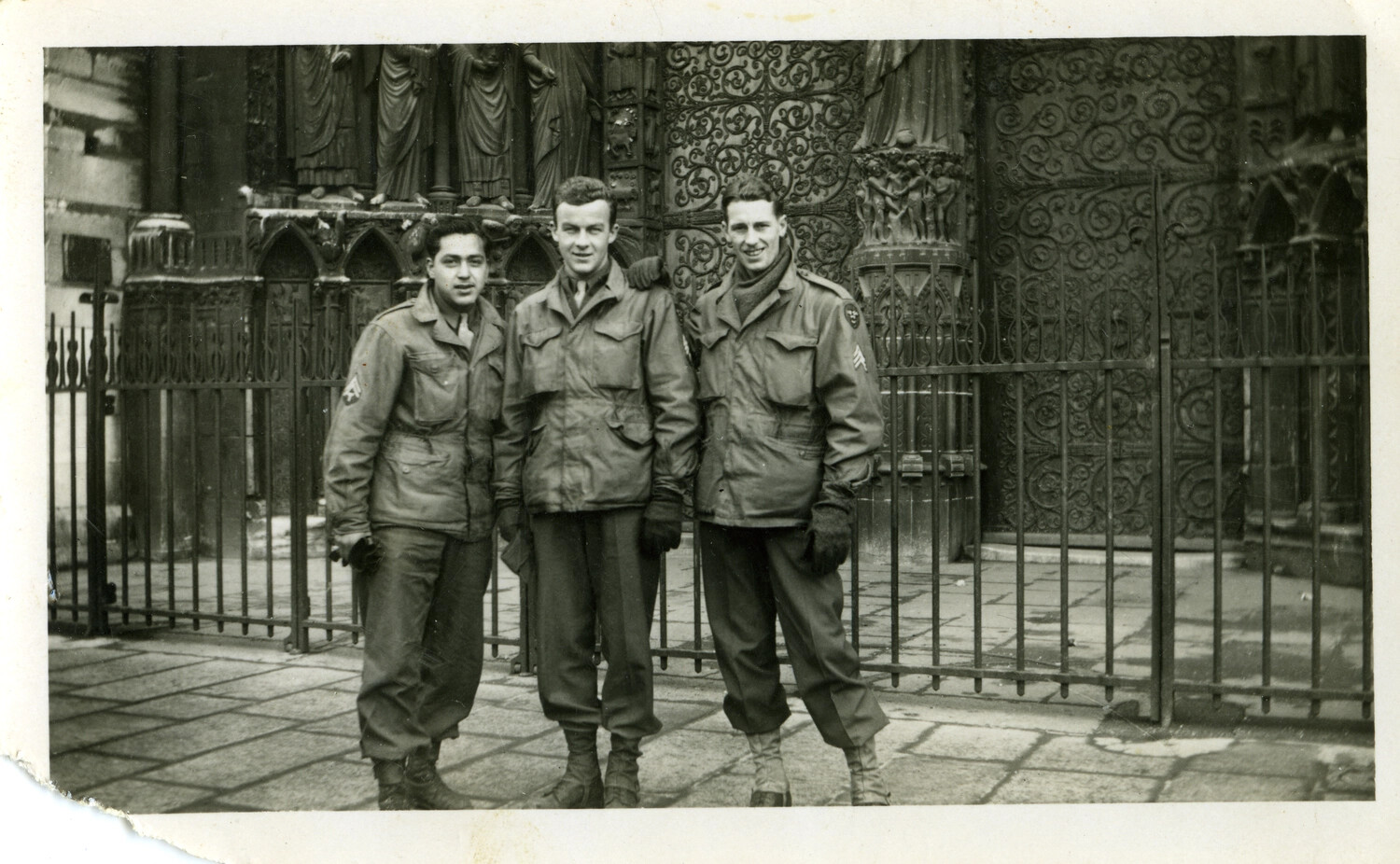 Three US Army Soldiers Posing Before a Gothic Cathedral Gate, Paris, WWII Era