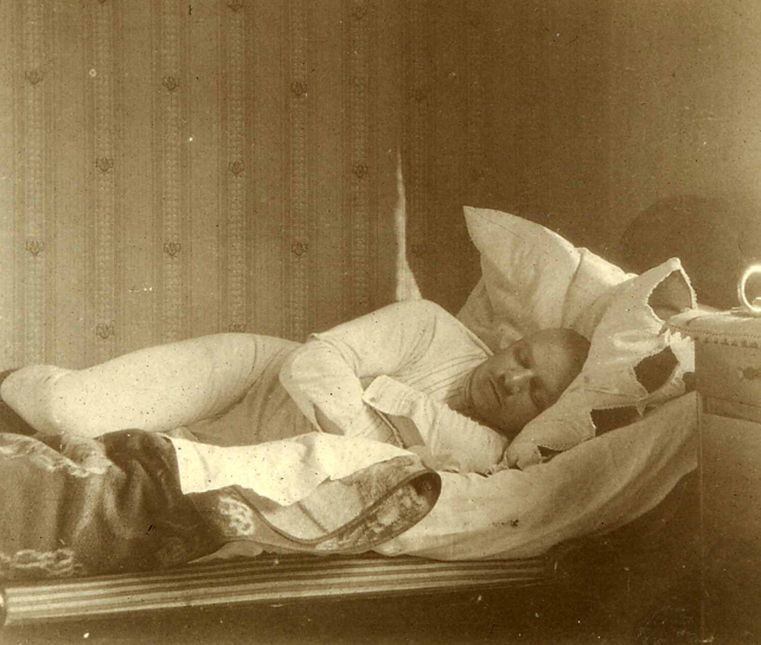 Sleeping Infant on Bed, Early 20th Century Domestic Photograph