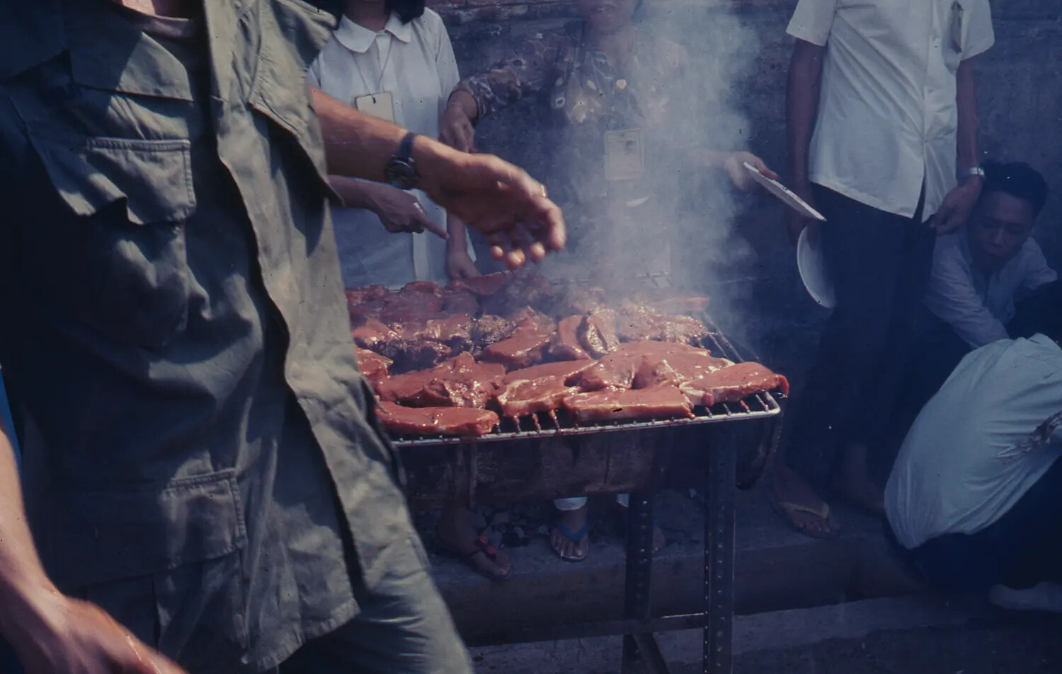 Vietnam War Era Color Slide — Outdoor Cookout/Barbecue with US Personnel and Vietnamese Civilians, 1968 Tet Period