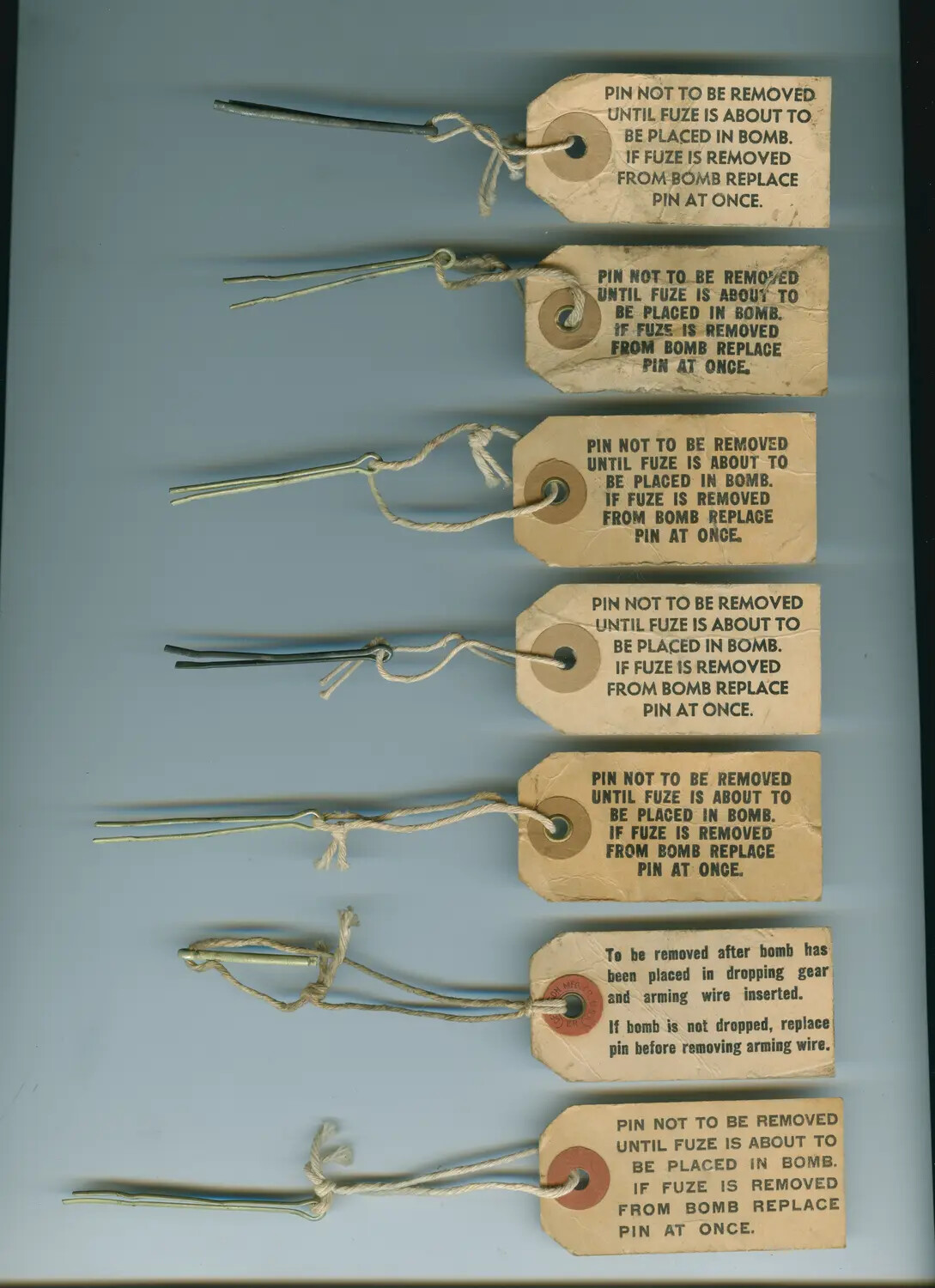WWII Aerial Bomb Fuze Safety Pins with Warning Tags