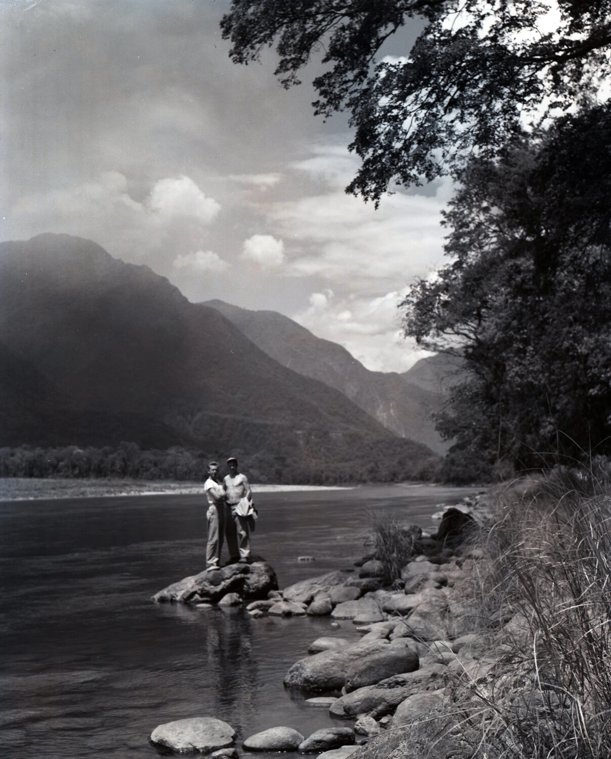 Servicemen on River Boulder, Dinjan-Tibet Border Region, CBI Theater, WWII