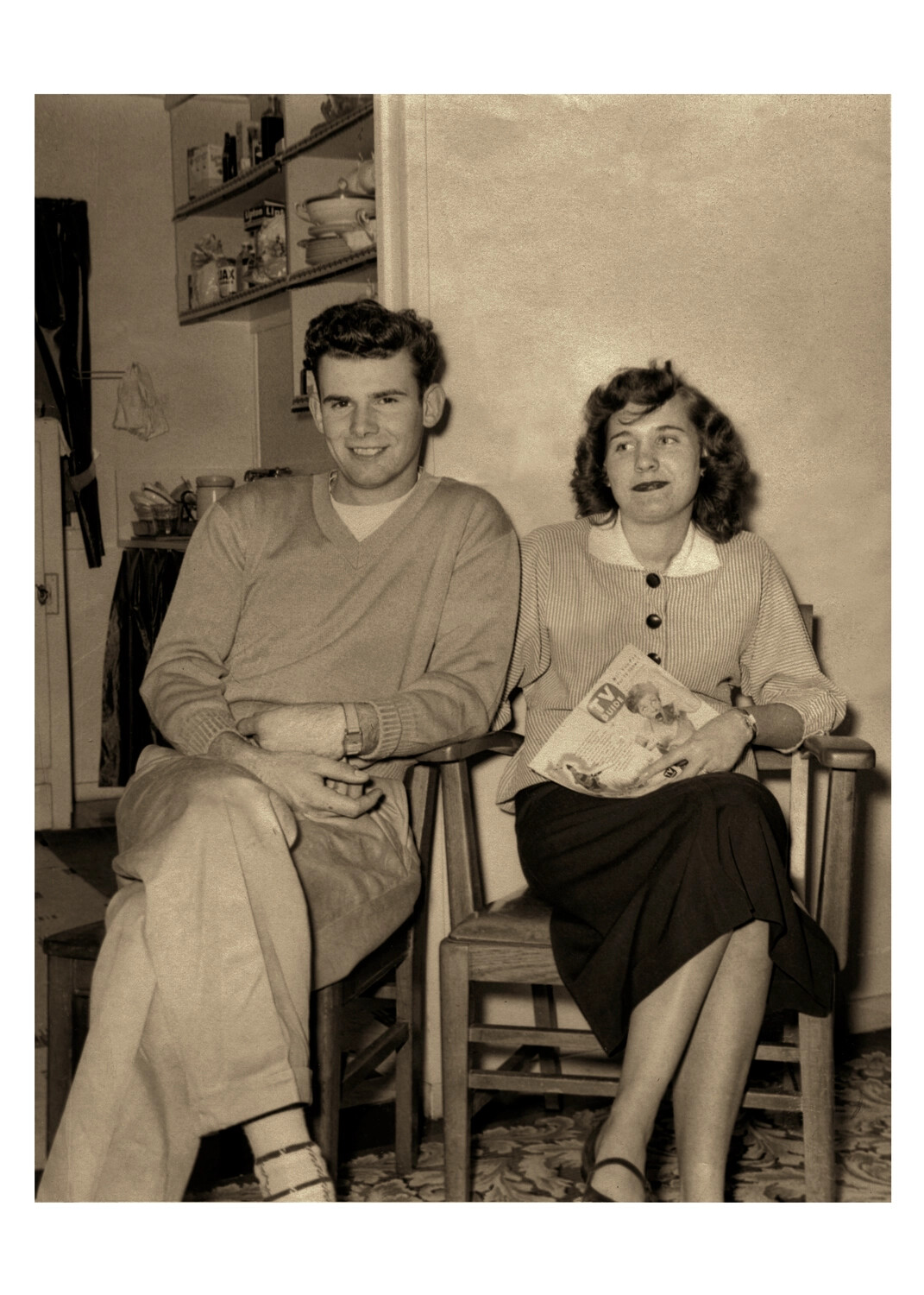 Young Man and Woman Seated in Home Kitchen, Joseph Smith Material, Lt. Bancroft Korean War Collection, Early 1950s