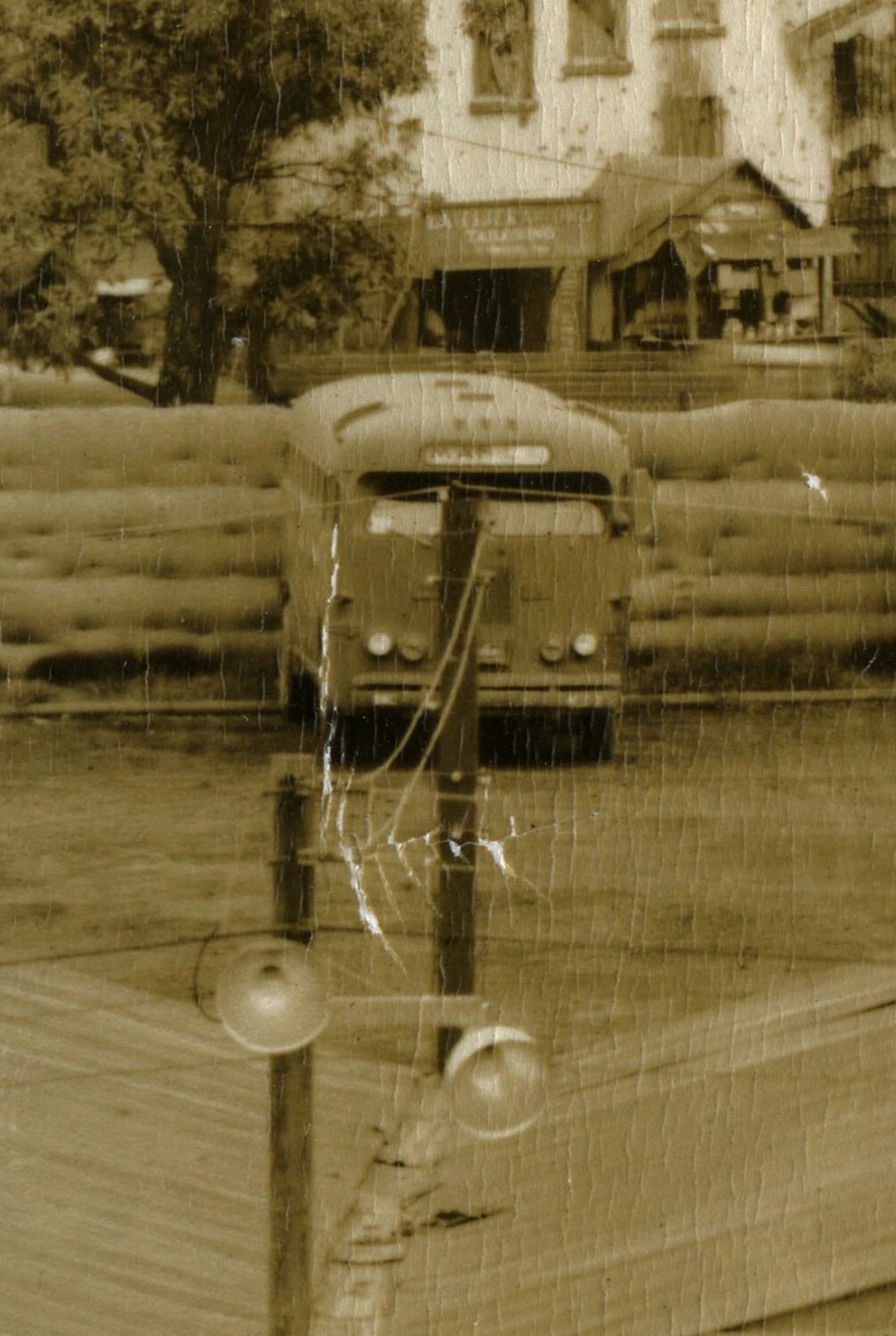 Manila Street Scene with Bus and Sandbag Barrier, WWII-Era Panorama Segment