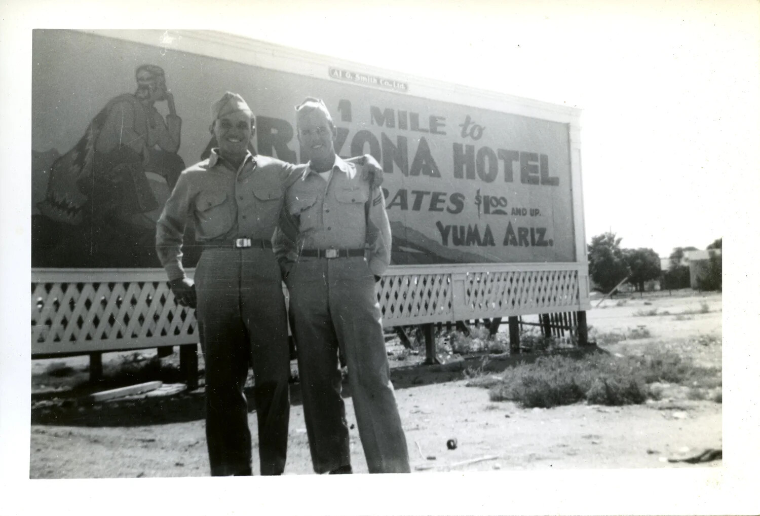 Two Servicemen Beside 'Arizona Hotel' Billboard, Yuma, Arizona