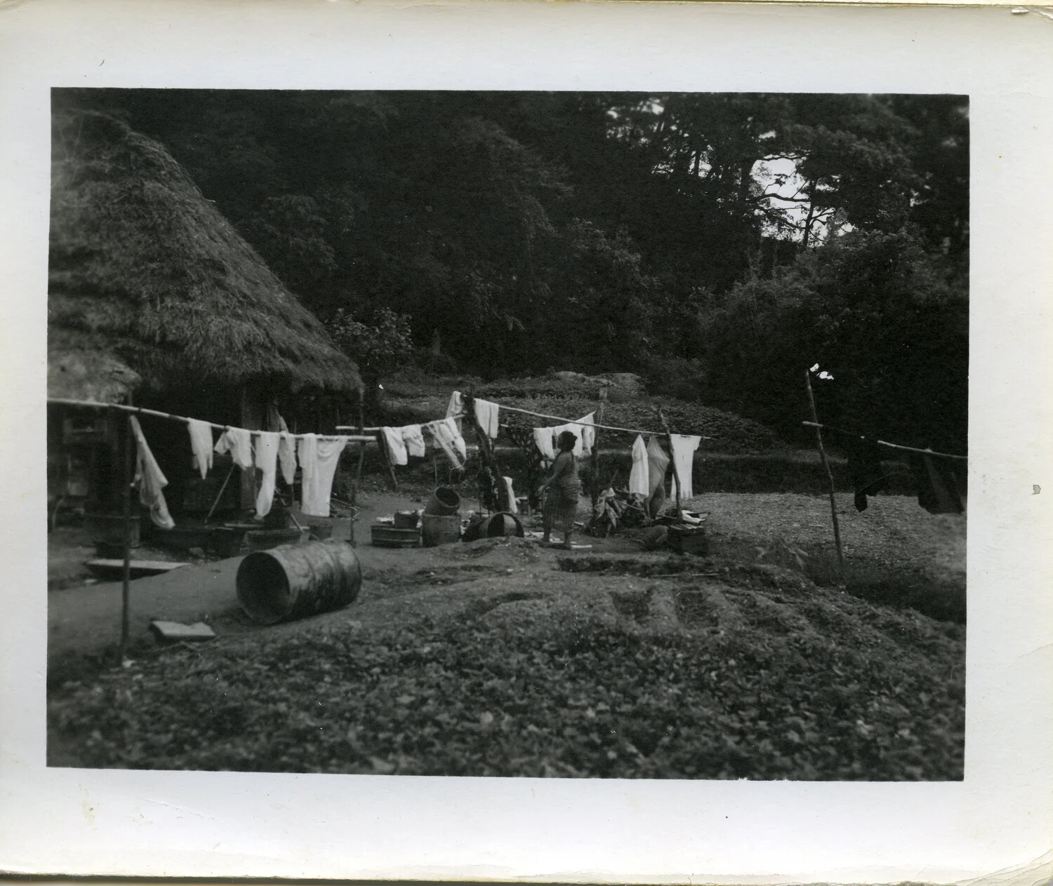 Okinawan Civilian Dwelling with Drying Laundry and Household Effects, Okinawa, 1945