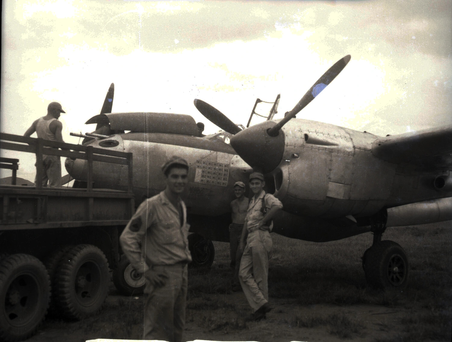 Lockheed P-38 Lightning Fighter with Ground Crew, Pacific Forward Airfield, WWII