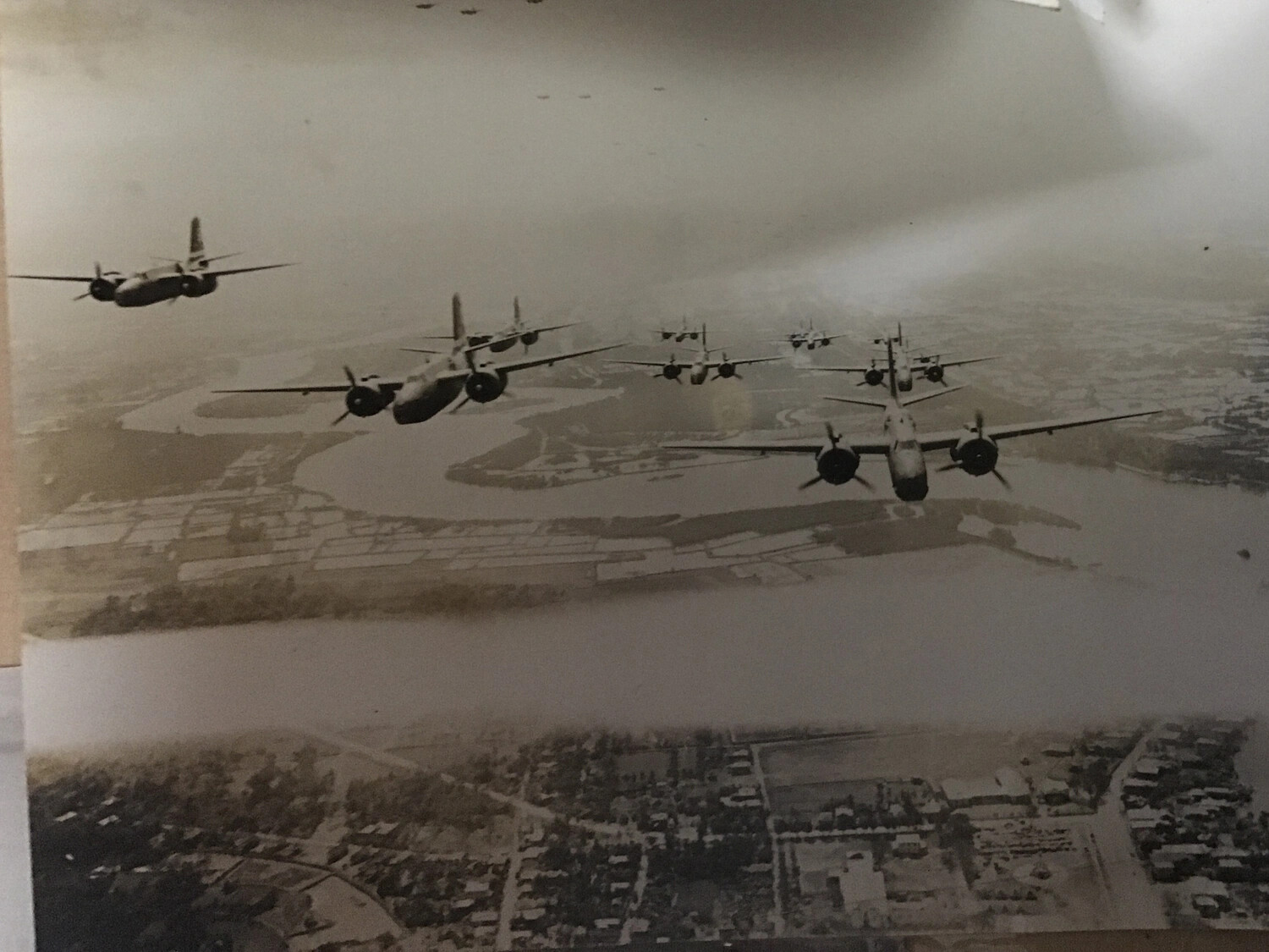 Formation of Twin-Engine Medium Bombers Over a River Delta - 312th Bomb Group Collection