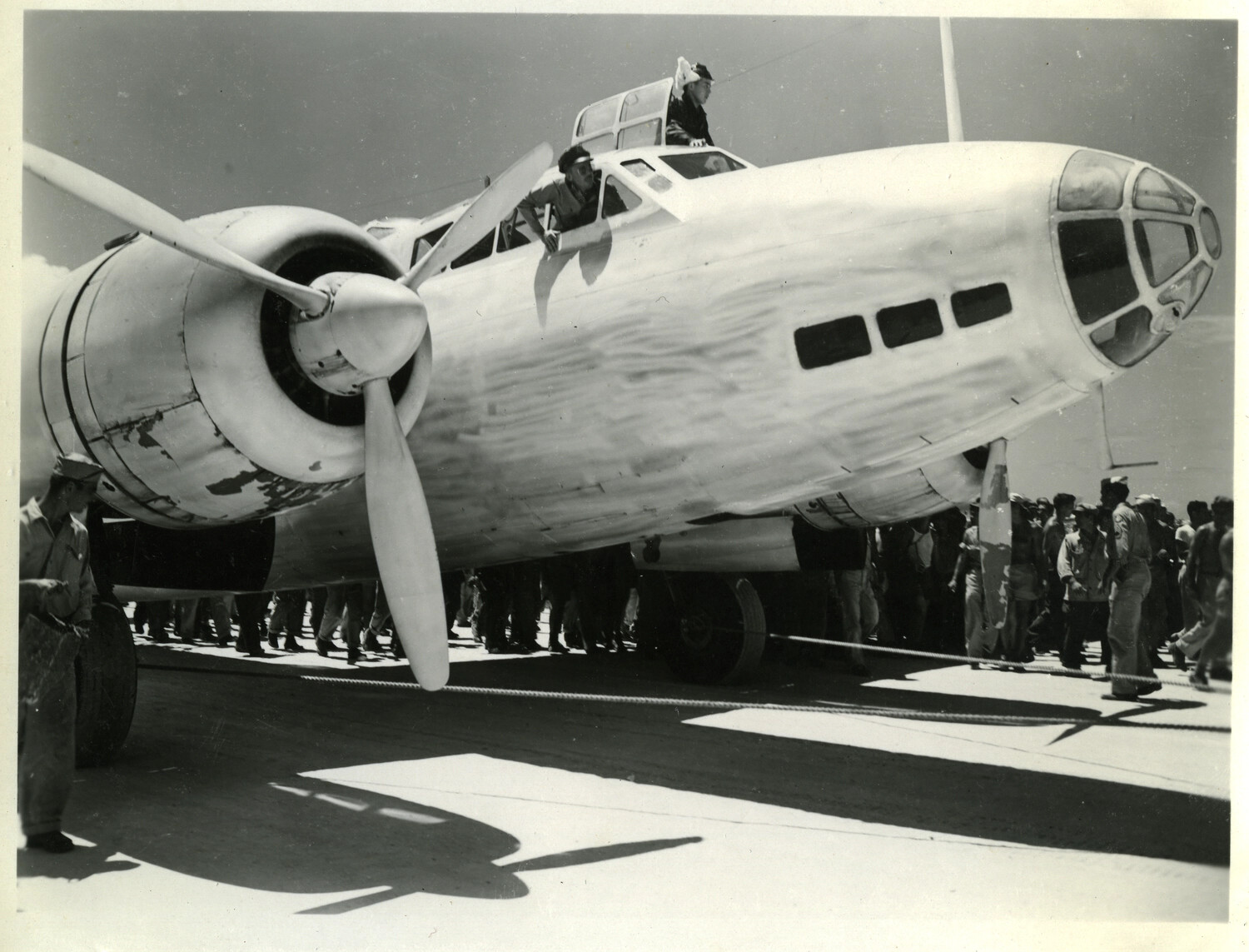 Japanese 'Betty' Bomber Surrounded by American Servicemen, Ie Shima, Okinawa, August 1945