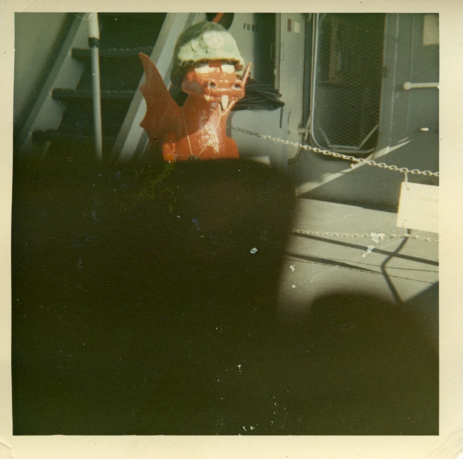 Ship's Mascot Figure on Deck — Vietnam Era, 1964, Saigon Vicinity